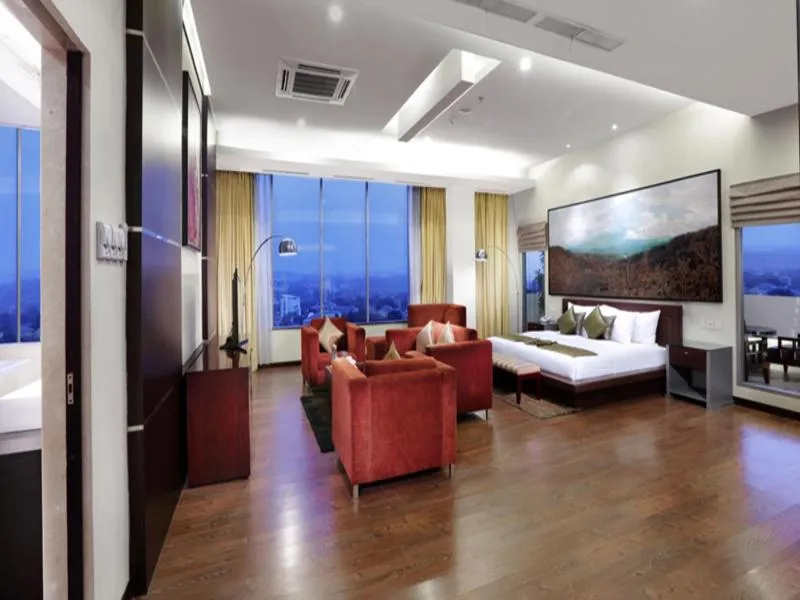 Bed in Grand Candi Hotel