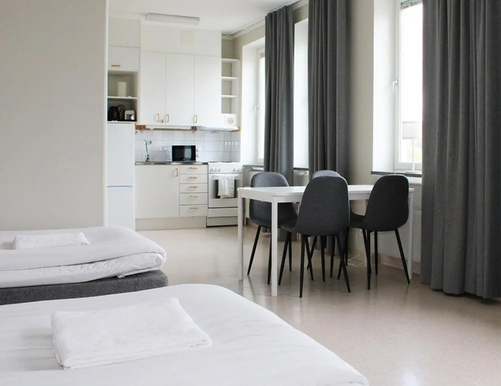 Kitchen or kitchenette, Bed in Sidsjö Hotell & Konferens