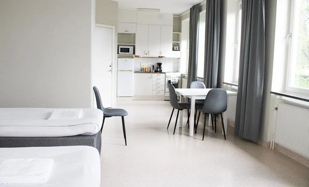 Kitchen or kitchenette, Bed in Sidsjö Hotell & Konferens