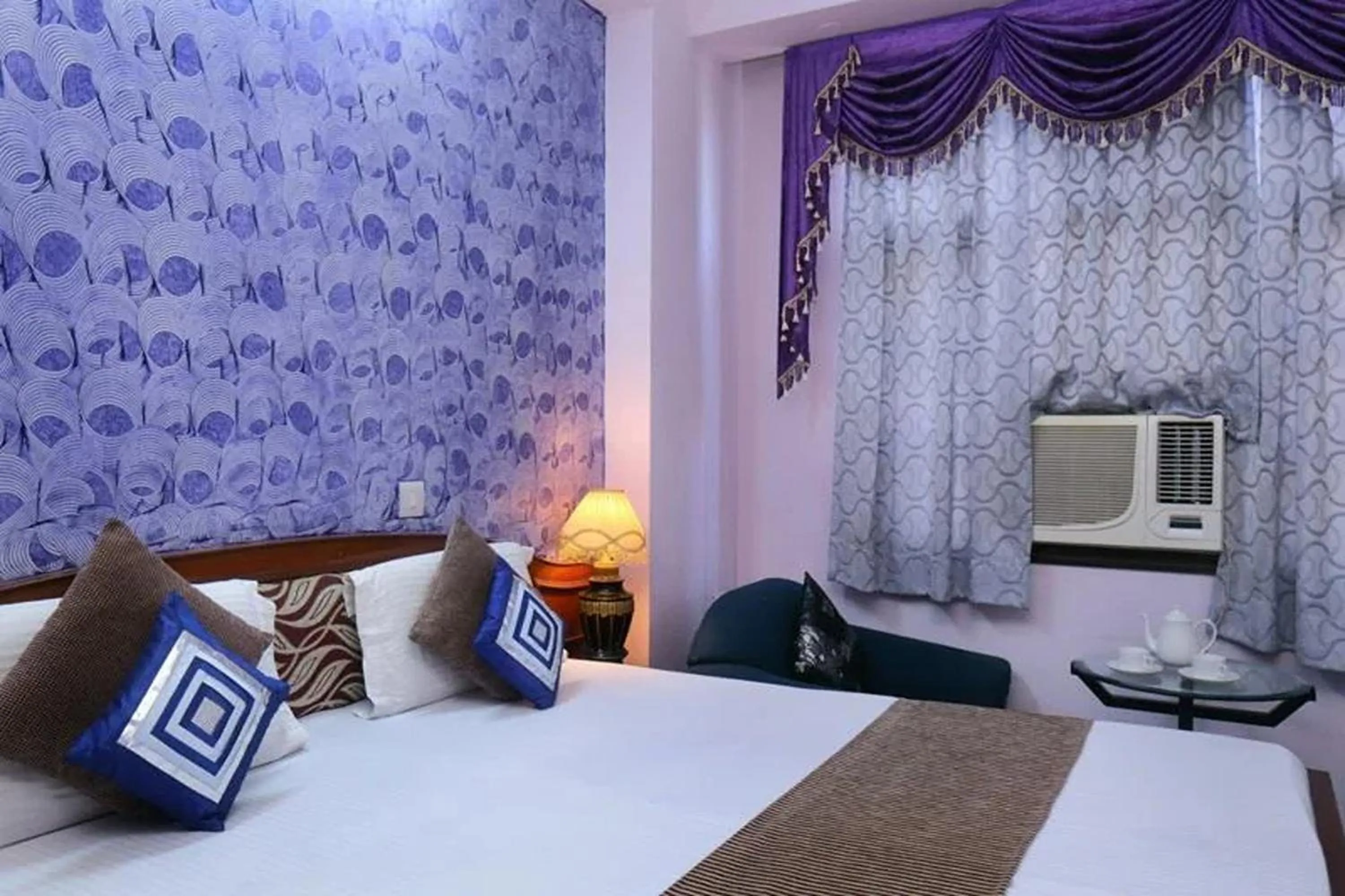 Bed in Hotel Indraprastha