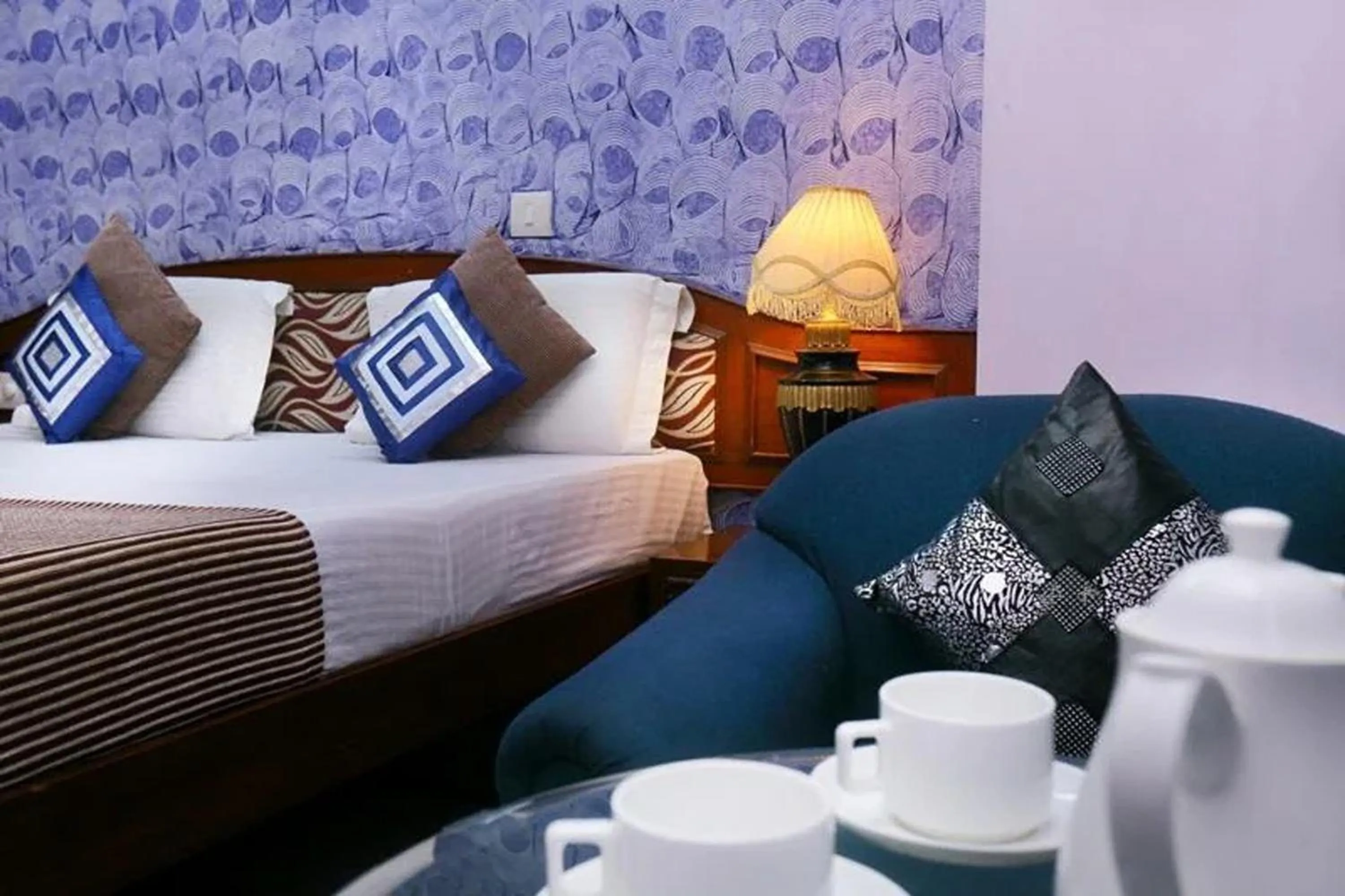 Bed in Hotel Indraprastha