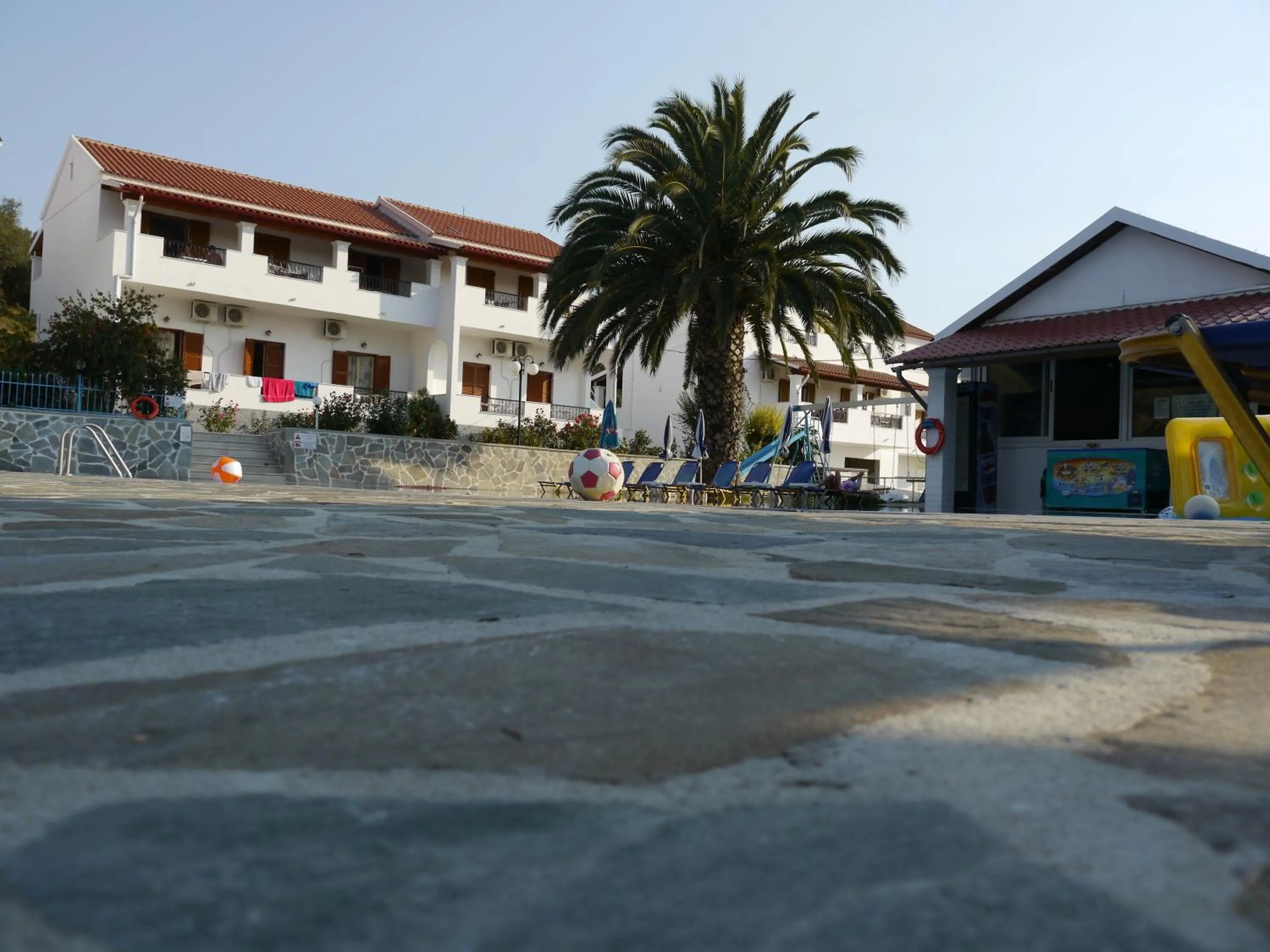 Property building in Tria Adelphia