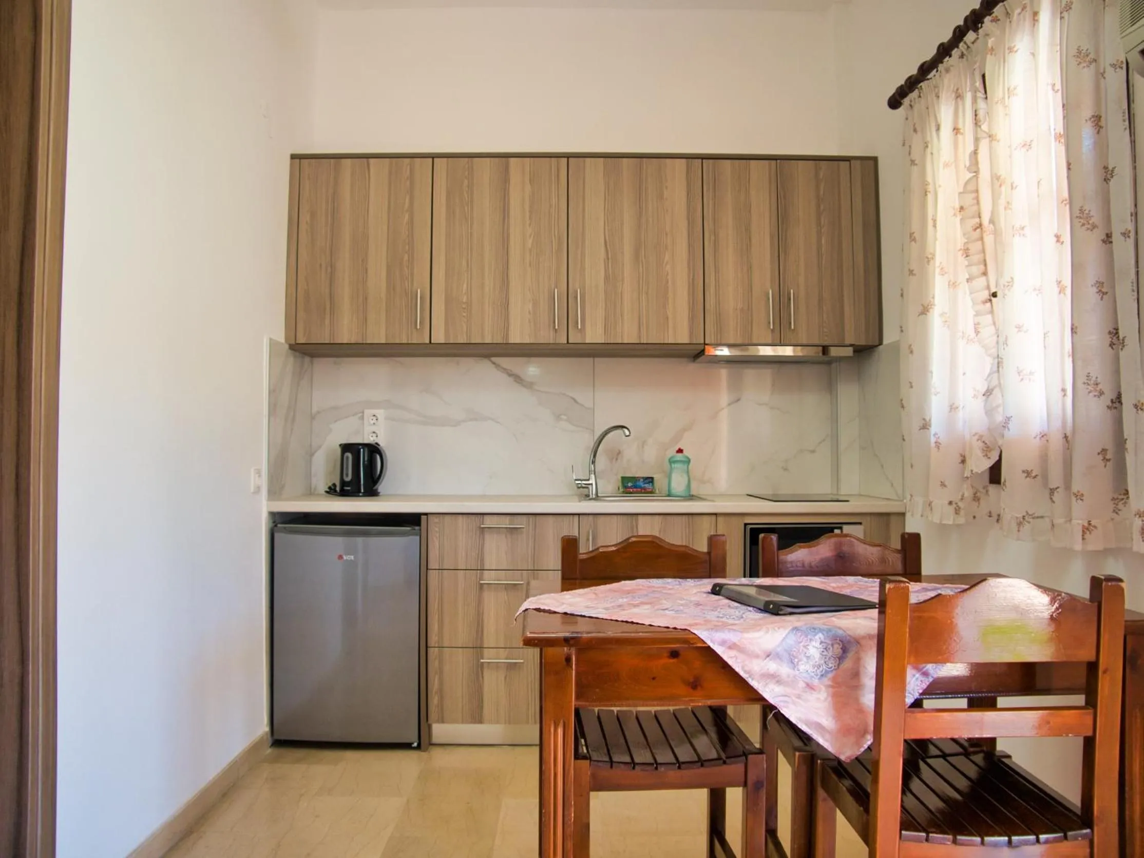 Kitchen or kitchenette in Tria Adelphia
