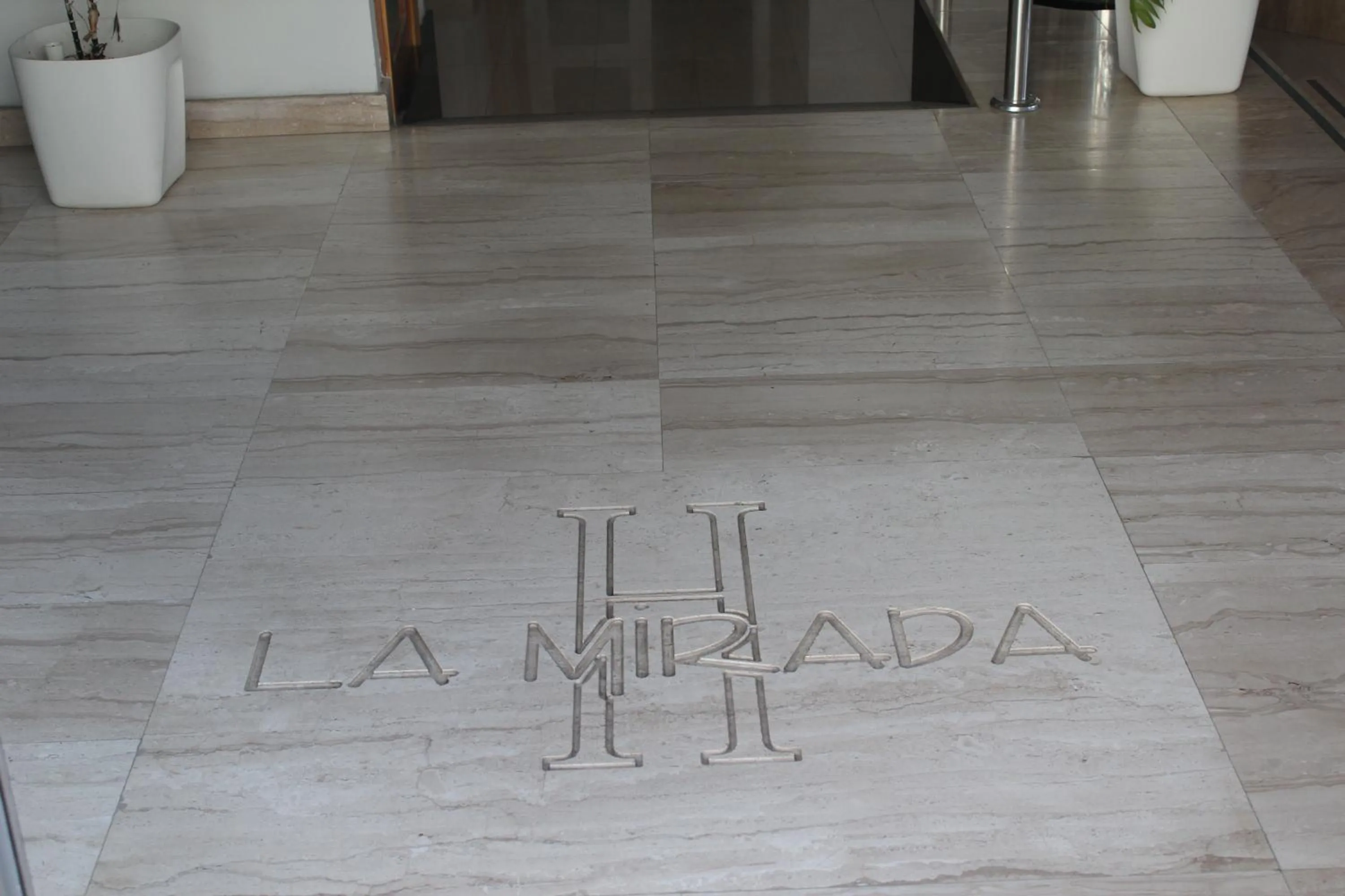 Property logo or sign in Hotel La Mirada