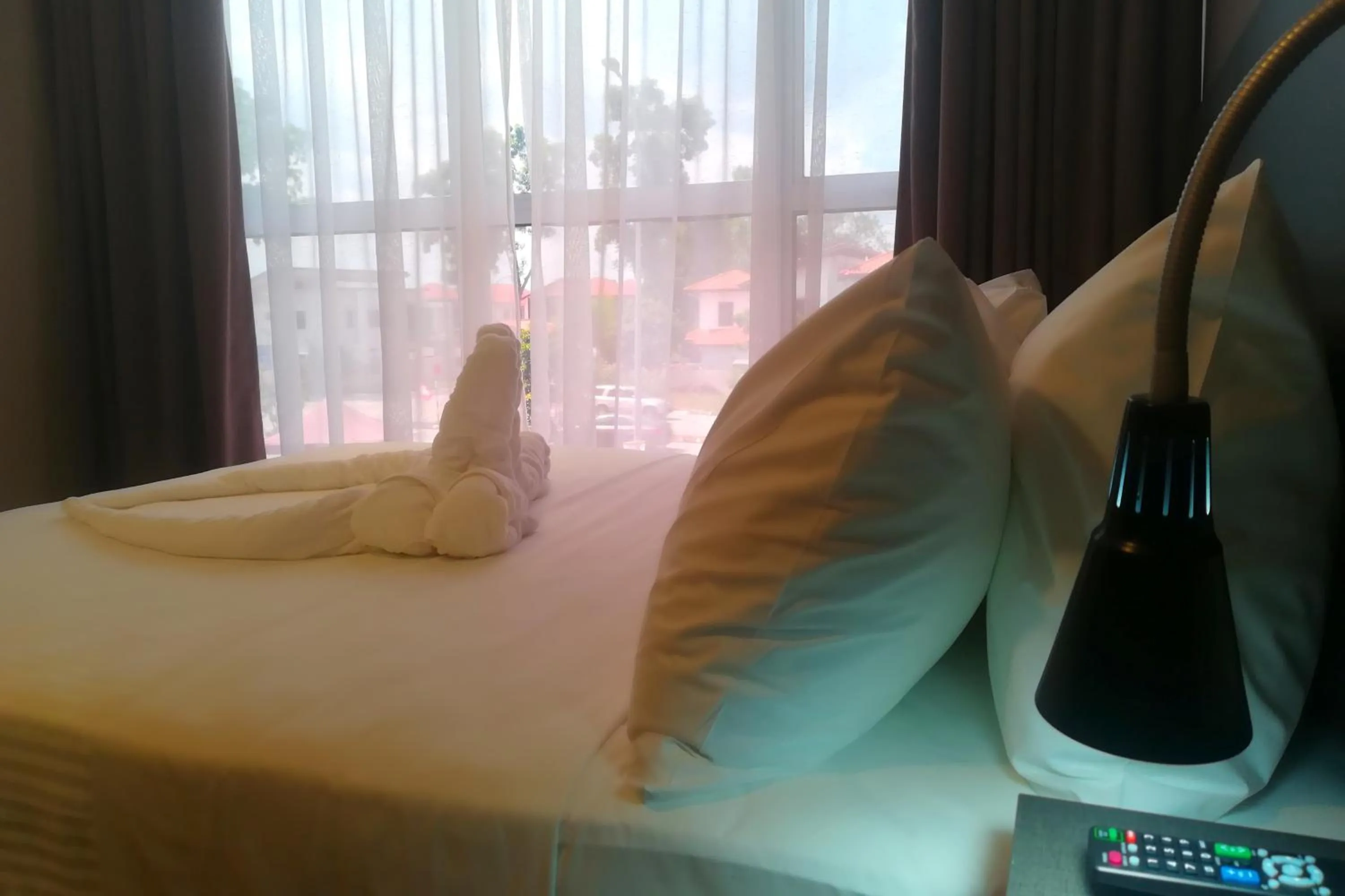 Property building, Bed in The Loft Plaza Hotel