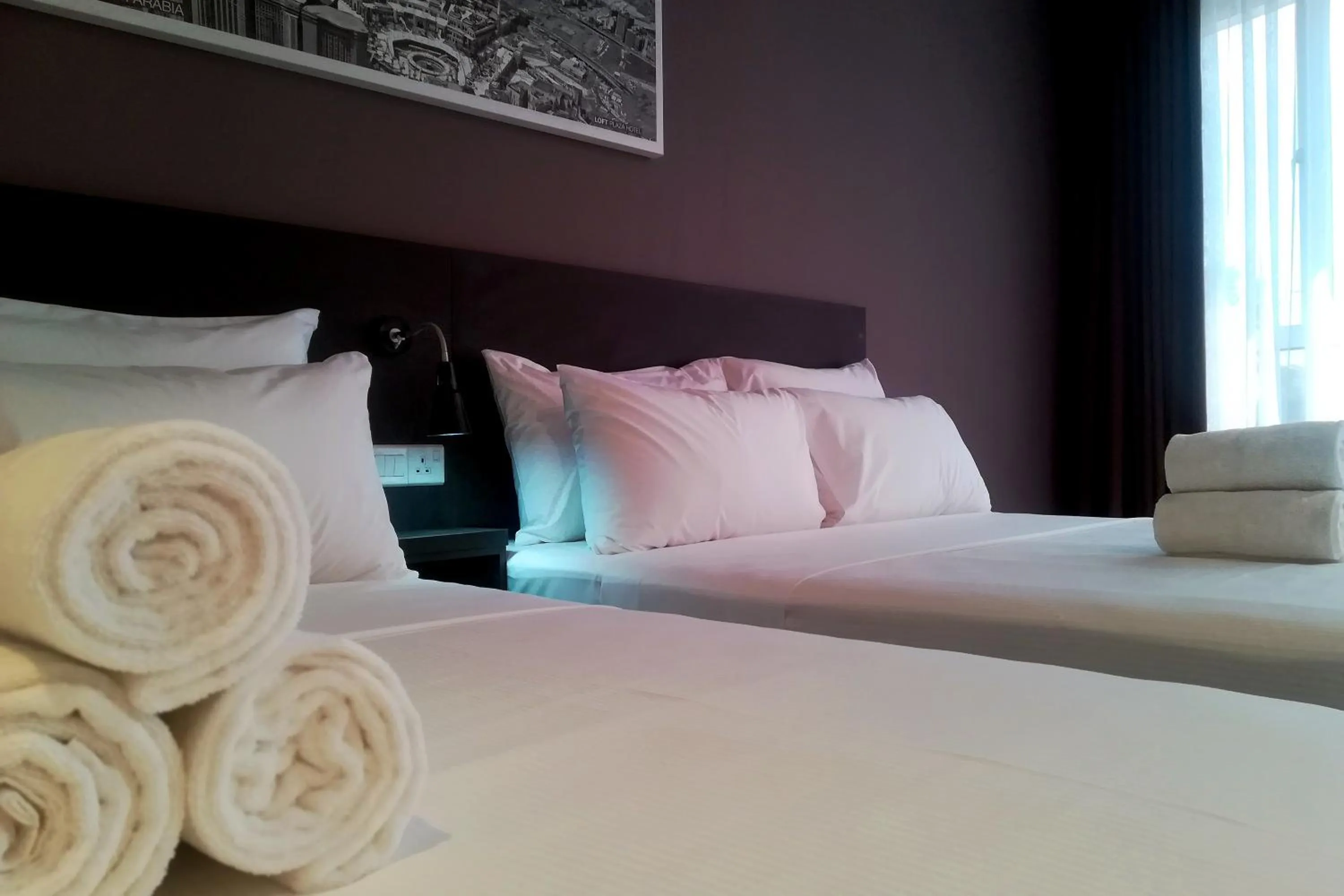 Property building, Bed in The Loft Plaza Hotel