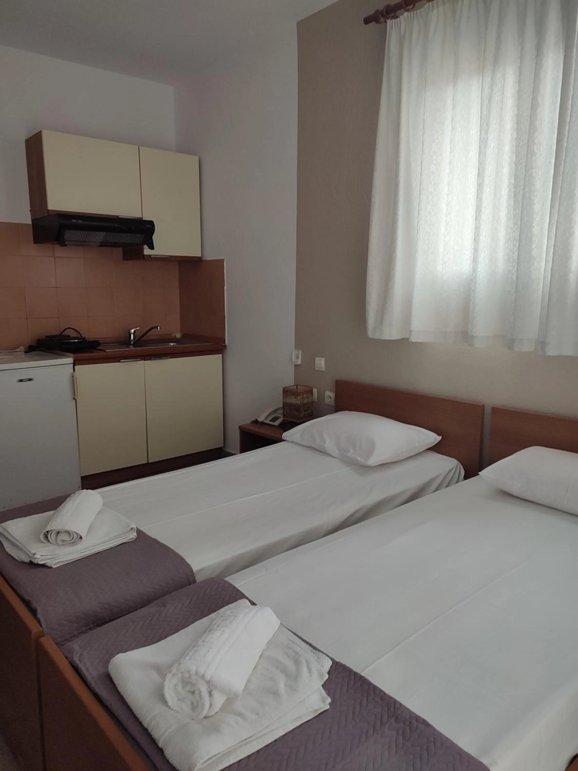 Photo of the whole room, Bed in Bella Grecia