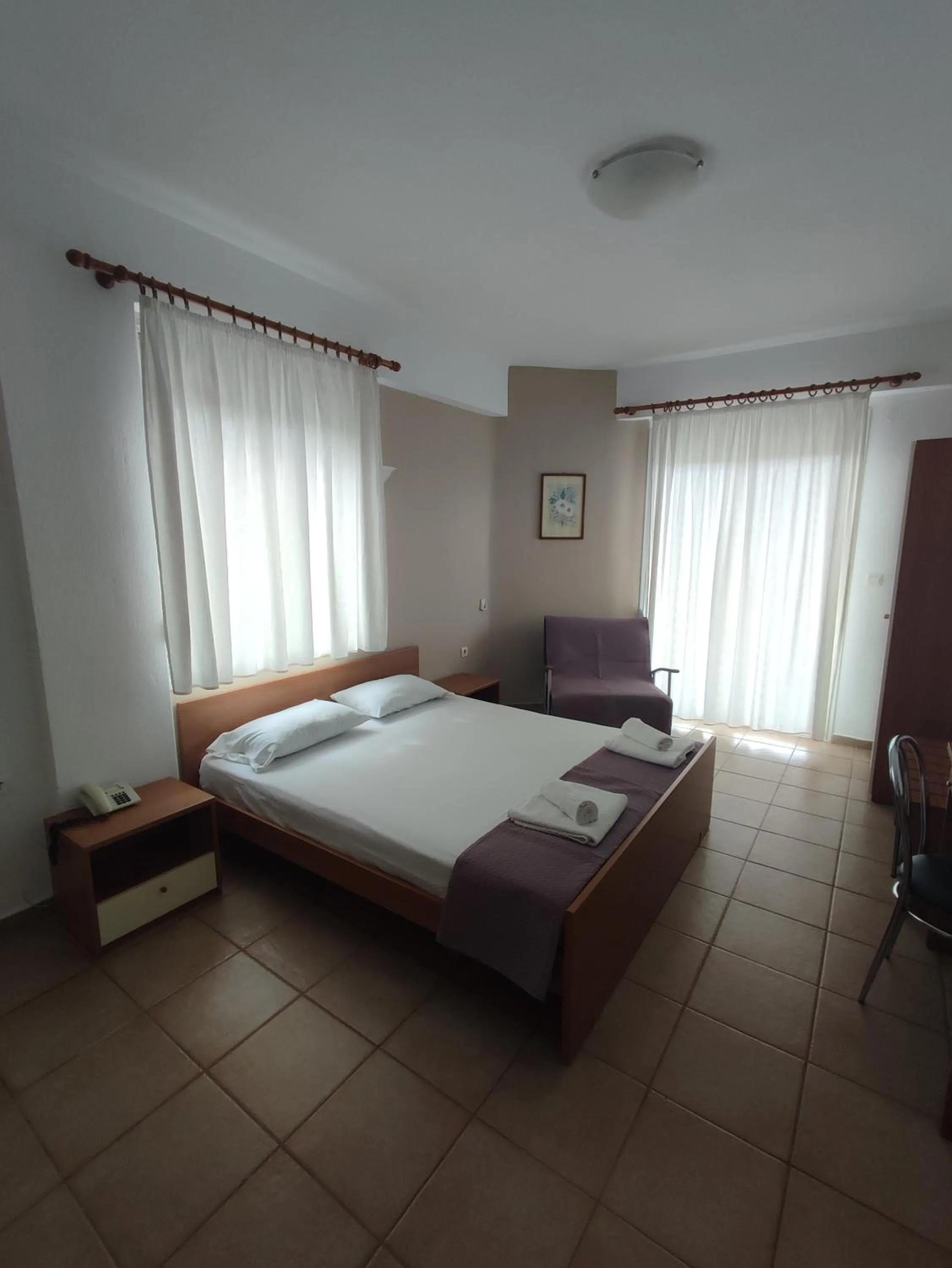 Photo of the whole room, Bed in Bella Grecia