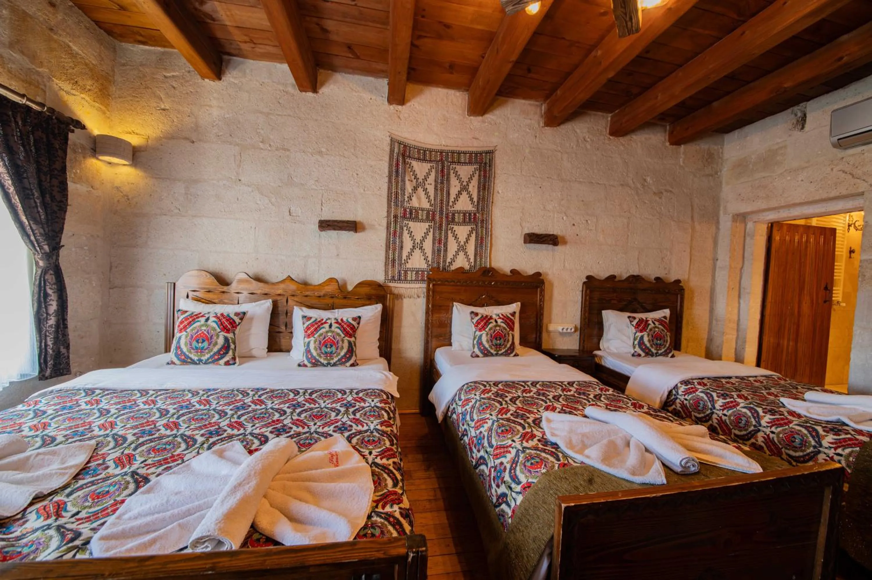 Bed in Safran Cave Hotel