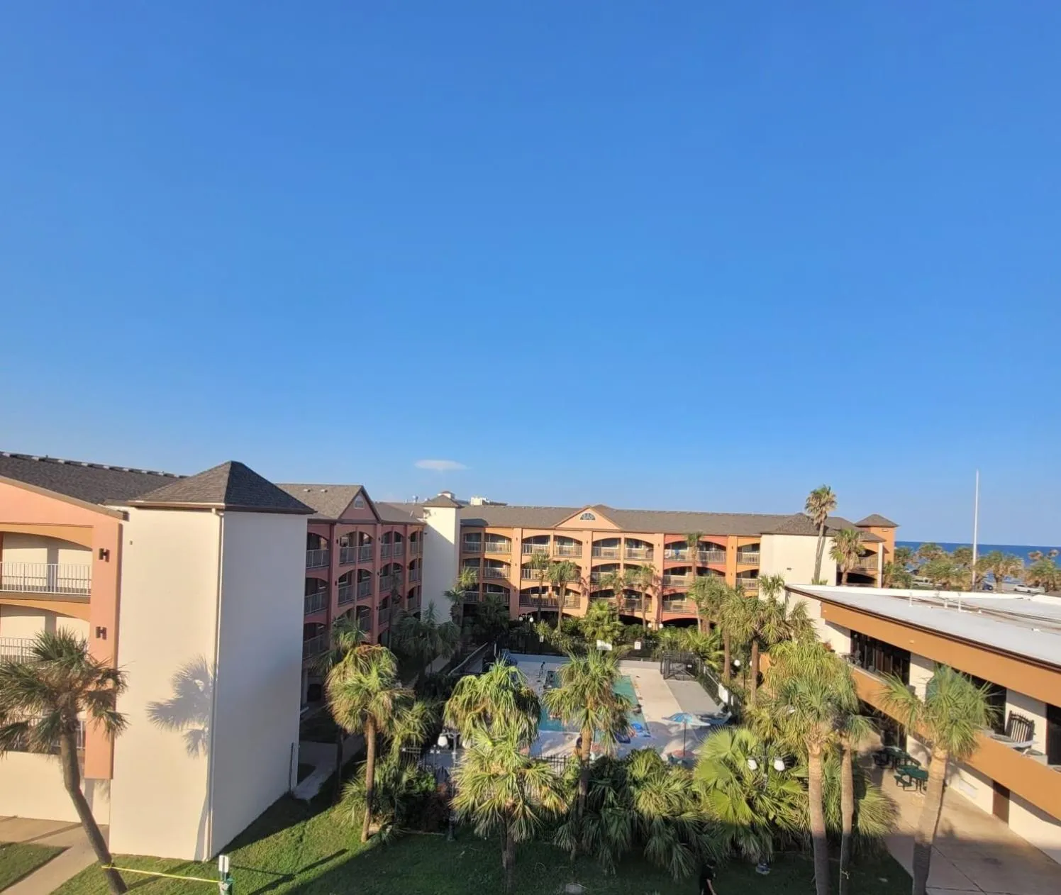 Pool view in Beachfront Palms Hotel Galveston
