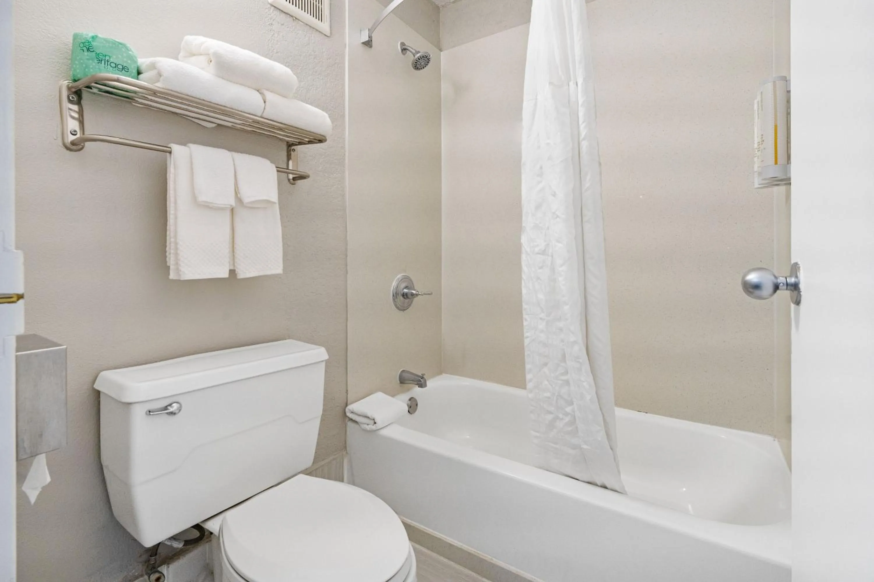 Toilet in Clarion Pointe Galveston - Beachfront