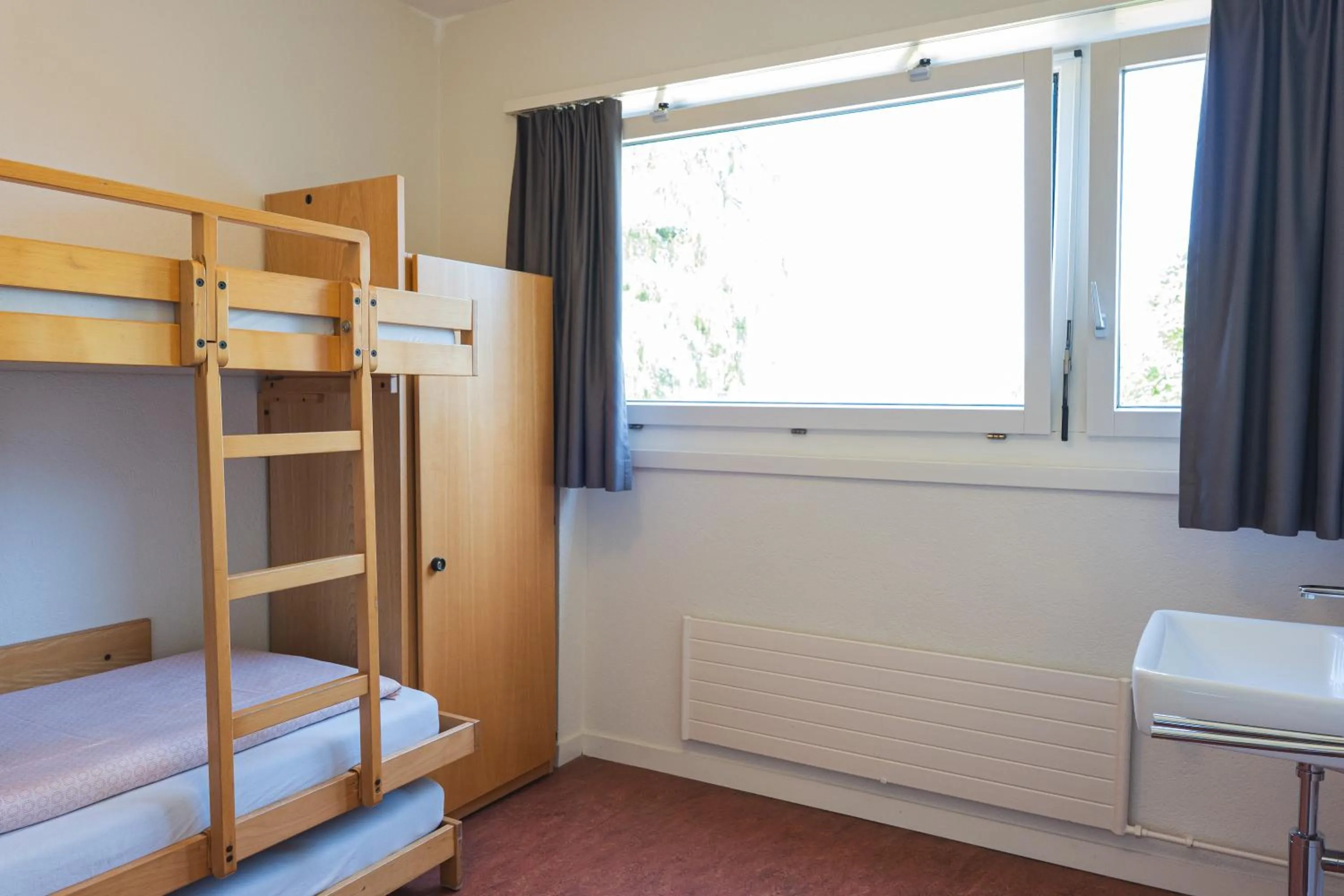 Bedroom, Bed in St. Gallen Youth Hostel