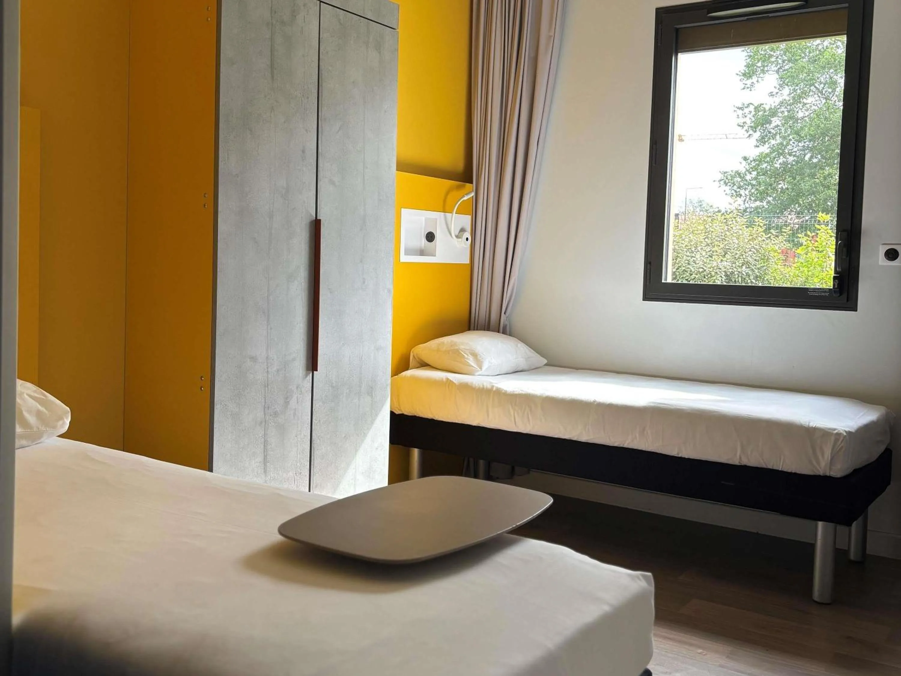 Bedroom, Bed in ibis budget Rennes Rte Lorient