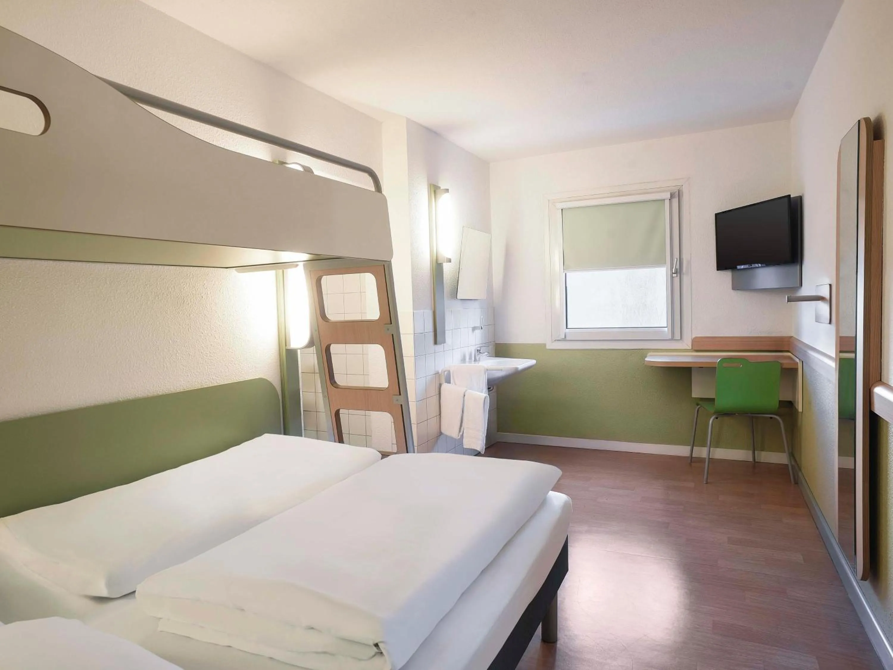 Photo of the whole room, Bed in B&B HOTEL Flensburg-City