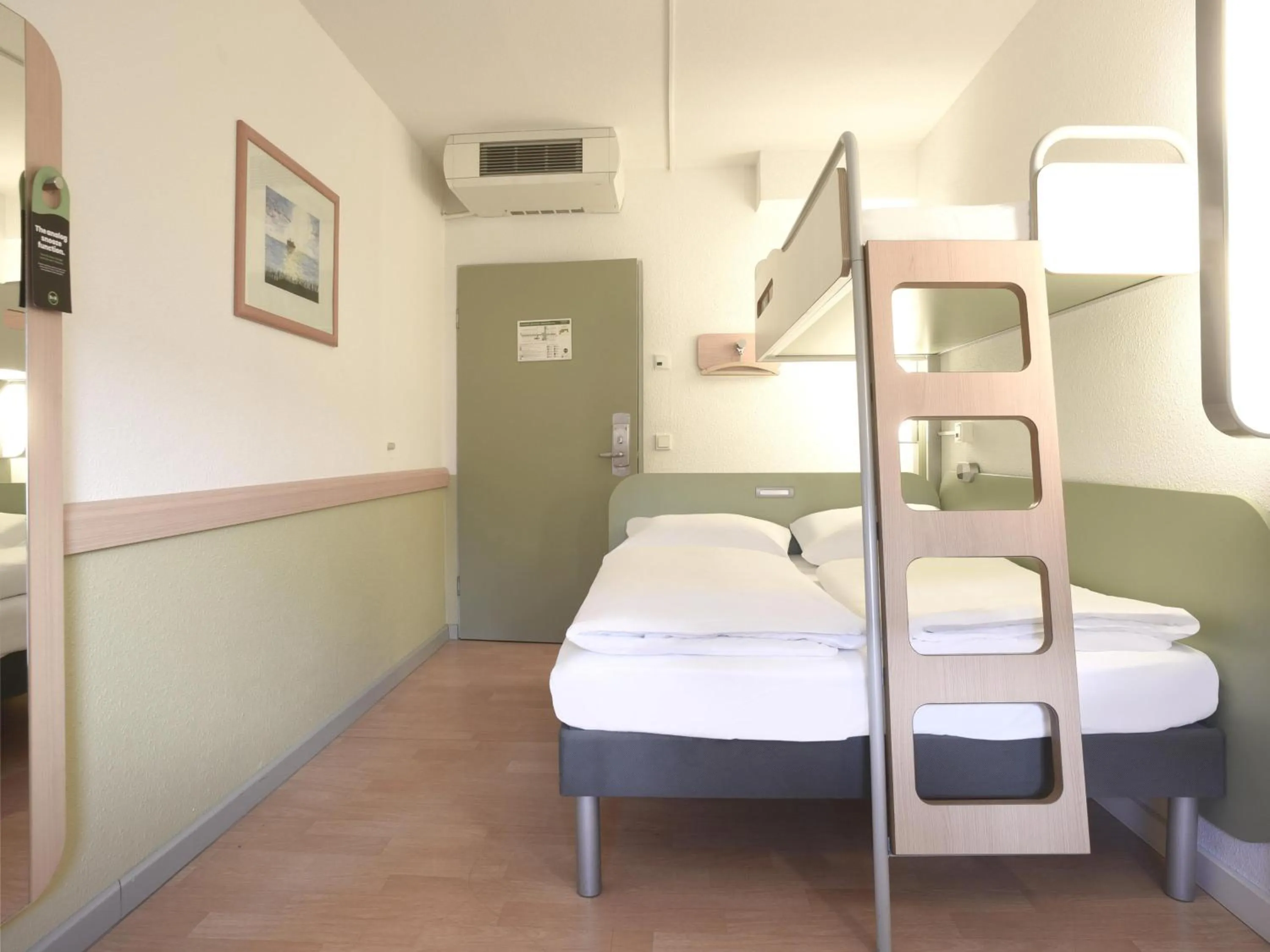 Photo of the whole room, Bed in B&B HOTEL Flensburg-City