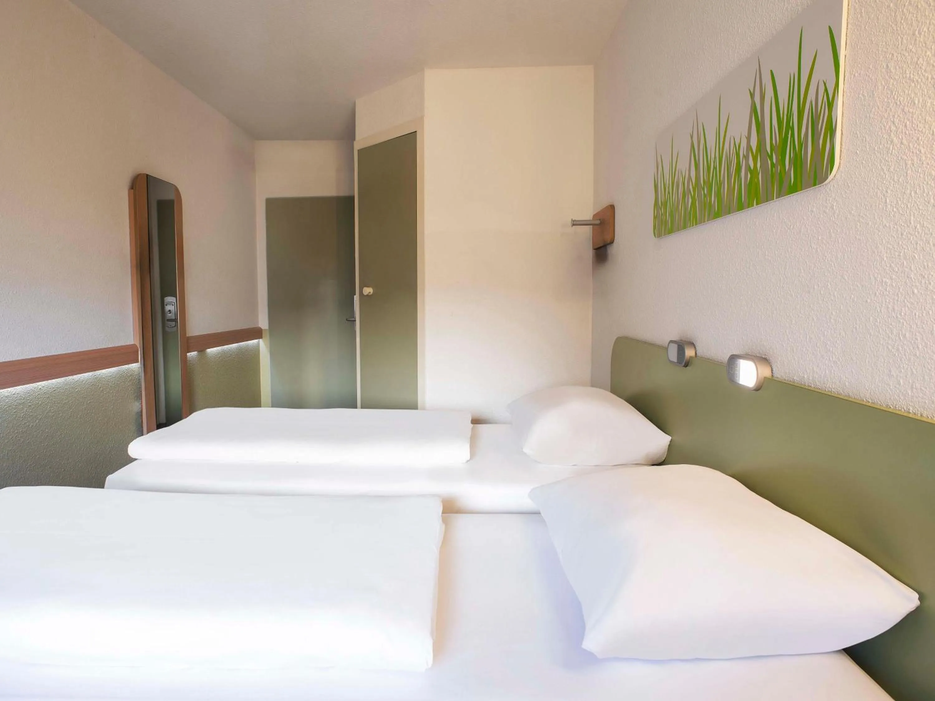 Photo of the whole room, Bed in B&B HOTEL Flensburg-City