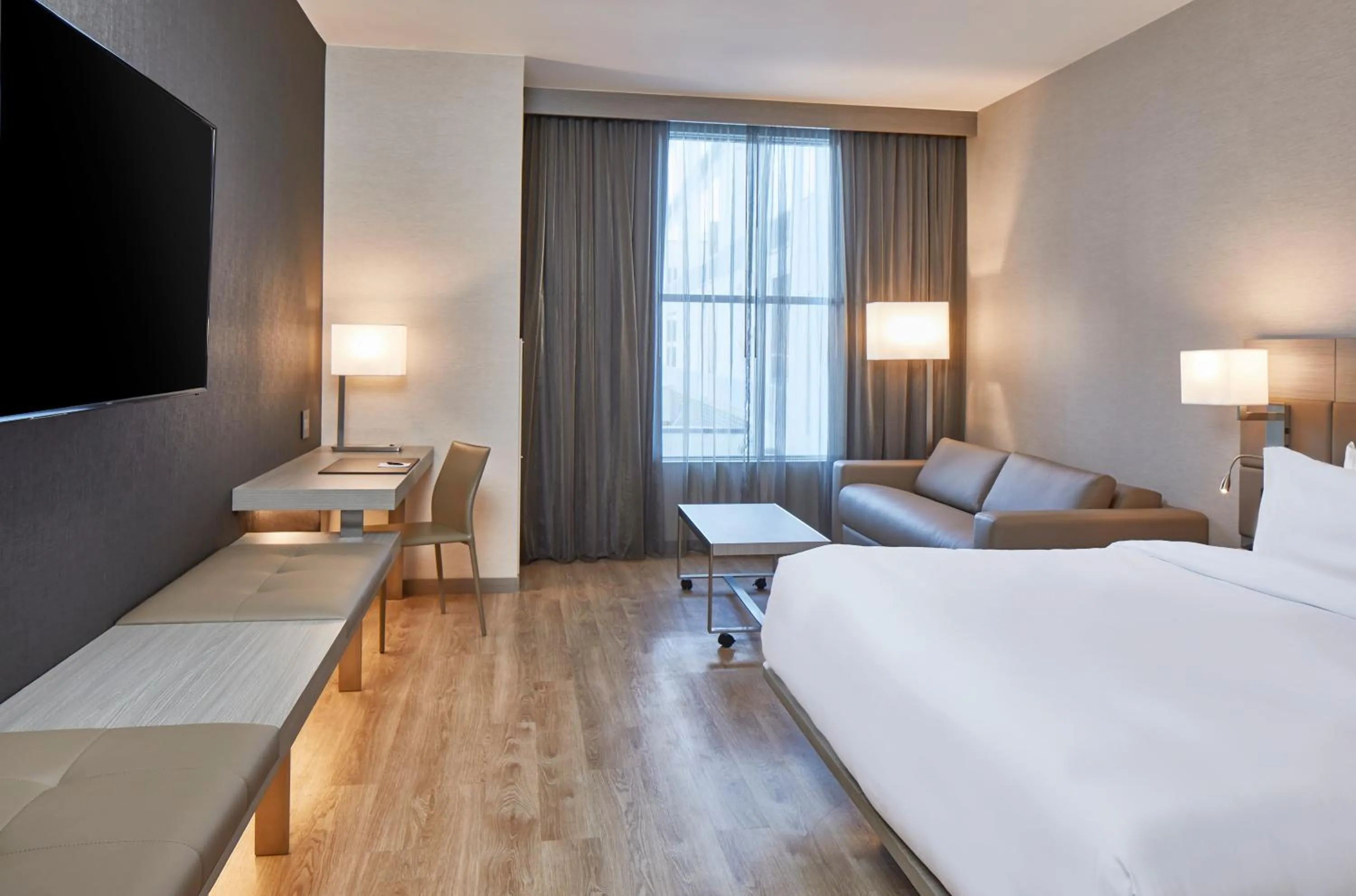 Bed in AC Hotel Nashville Downtown