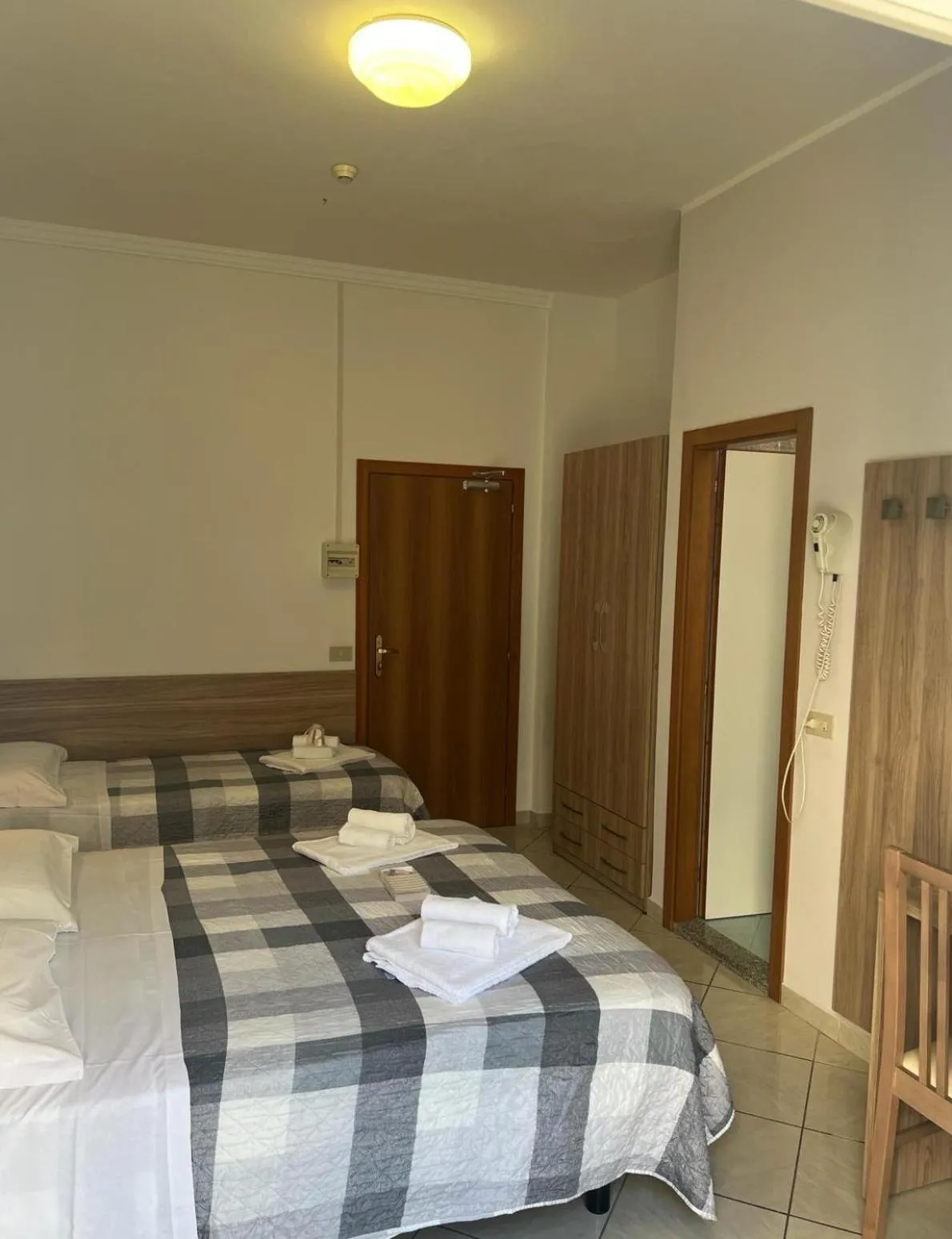 Bedroom in Hotel Blue Ribbon