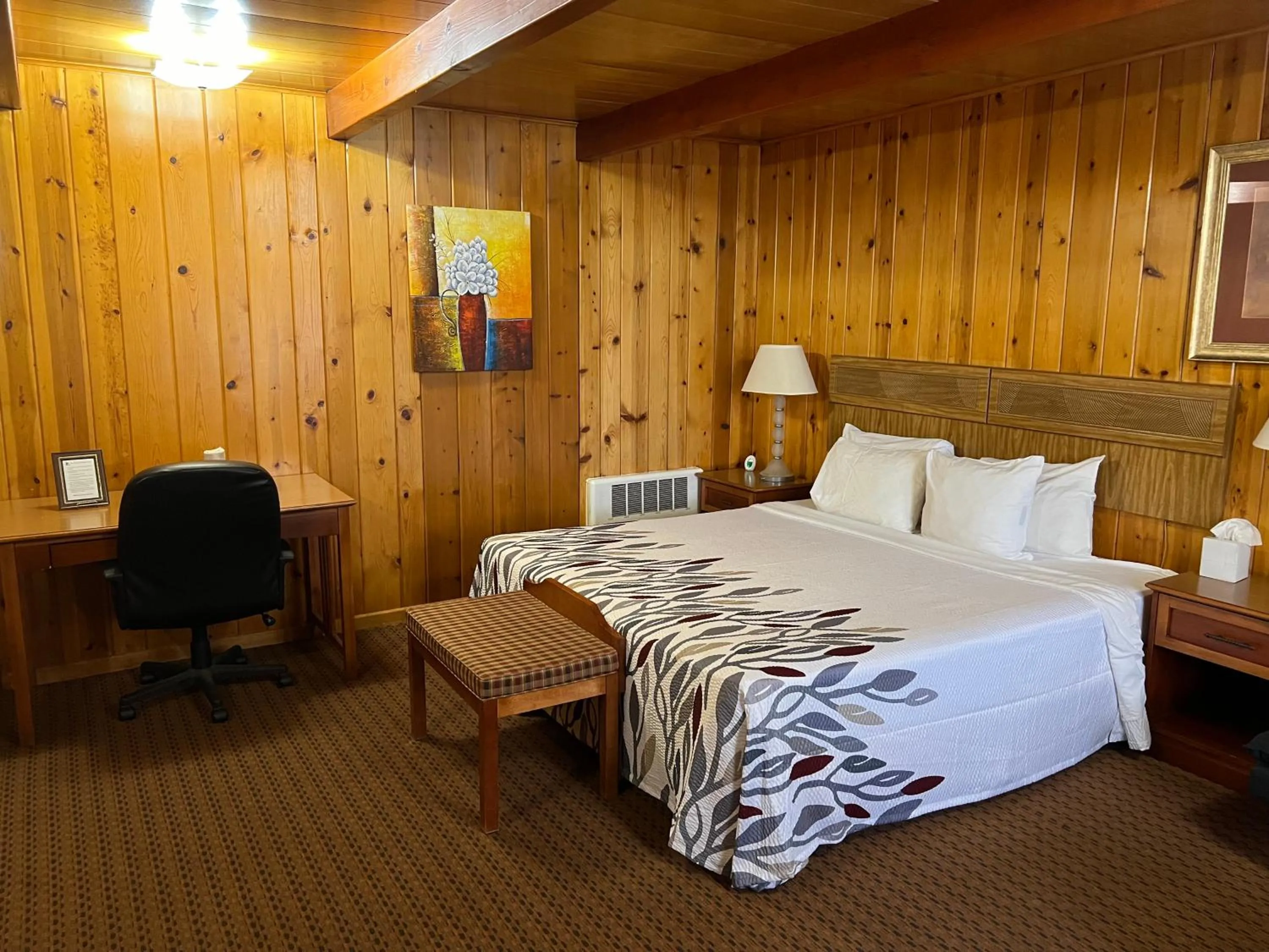 Bed in Prospector Motor Lodge