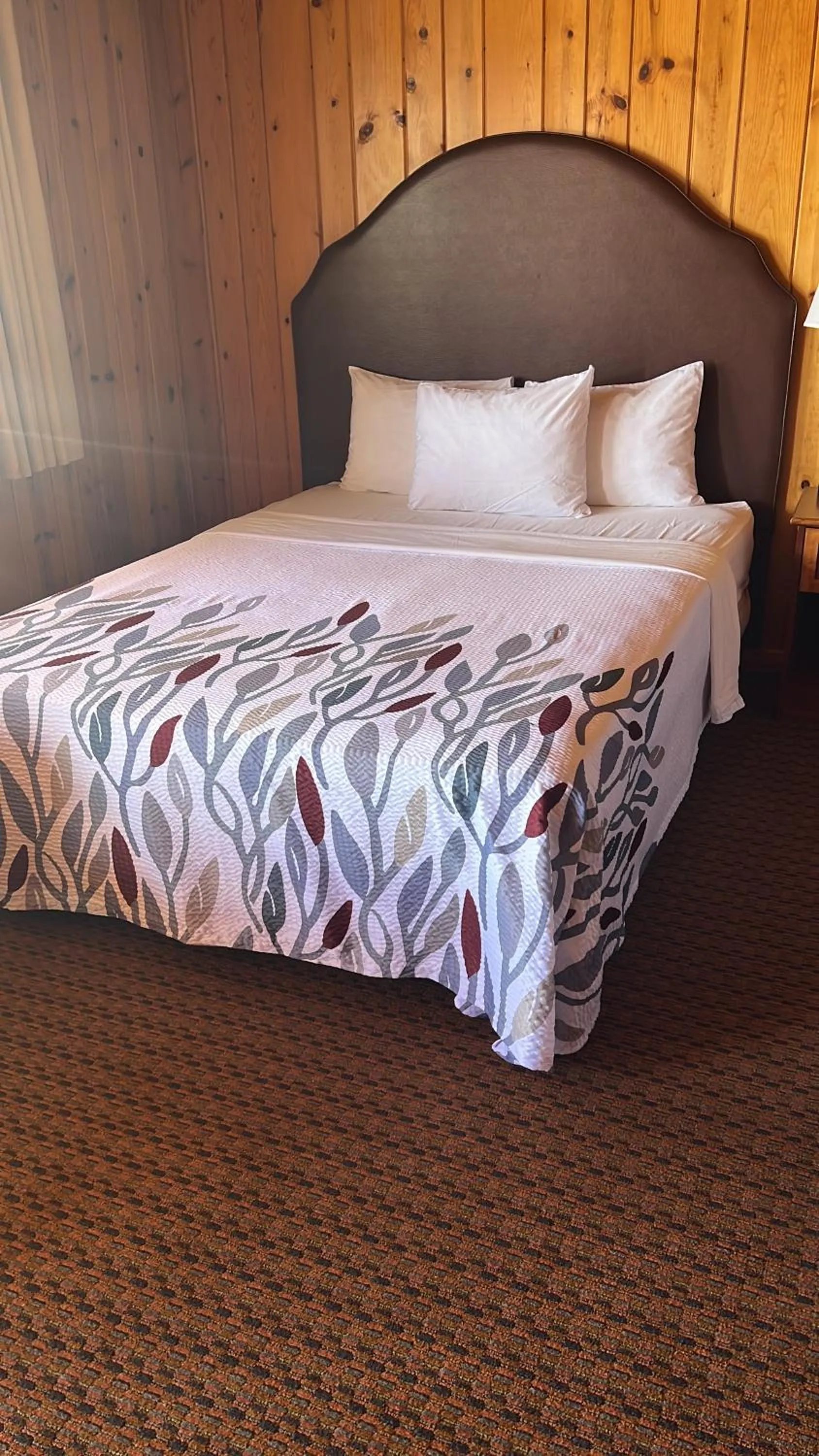 Bed in Prospector Motor Lodge