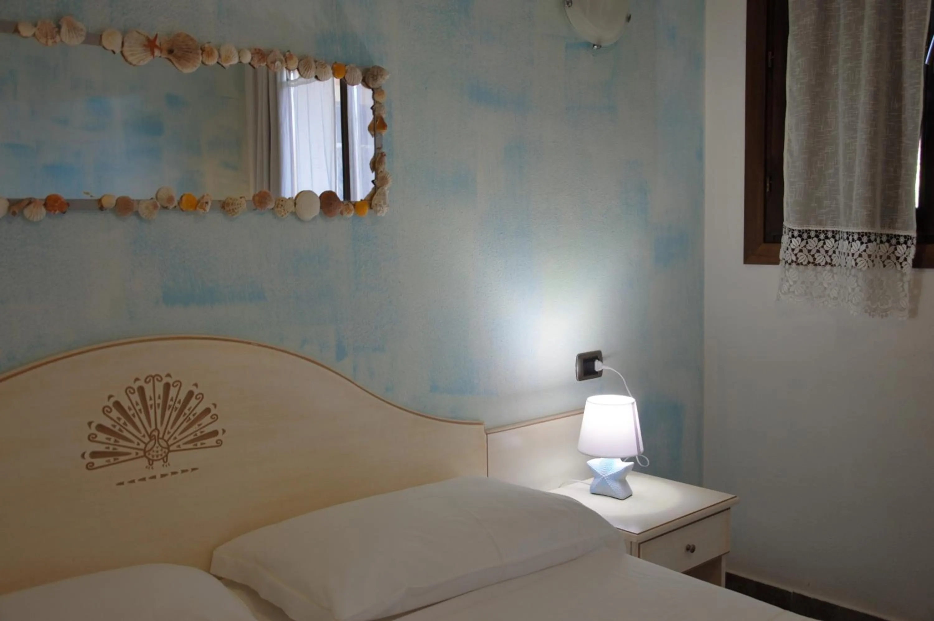 Photo of the whole room, Bed in Hotel Sa Cralla Villasimius