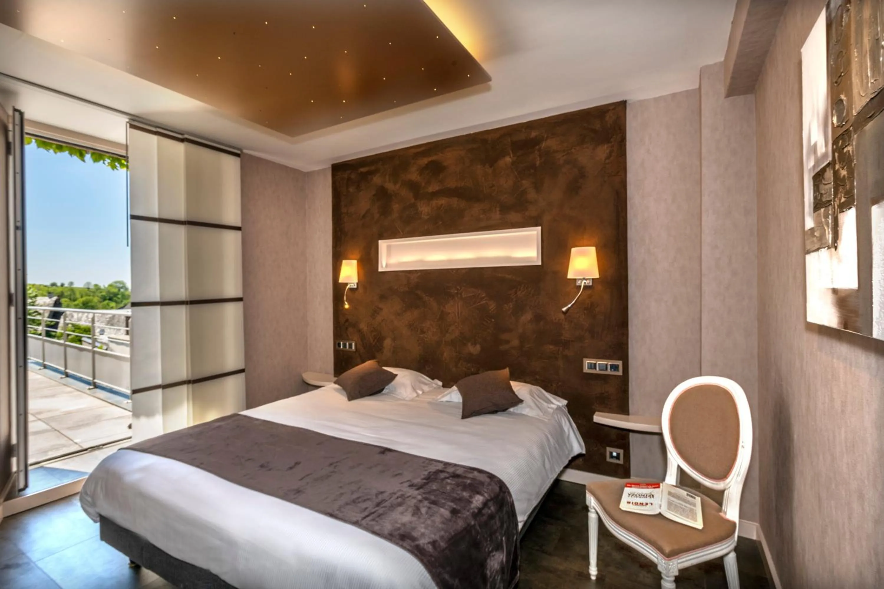 Photo of the whole room, Bed in Logis Hôtel Restaurant Gilles Moreau Laguiole