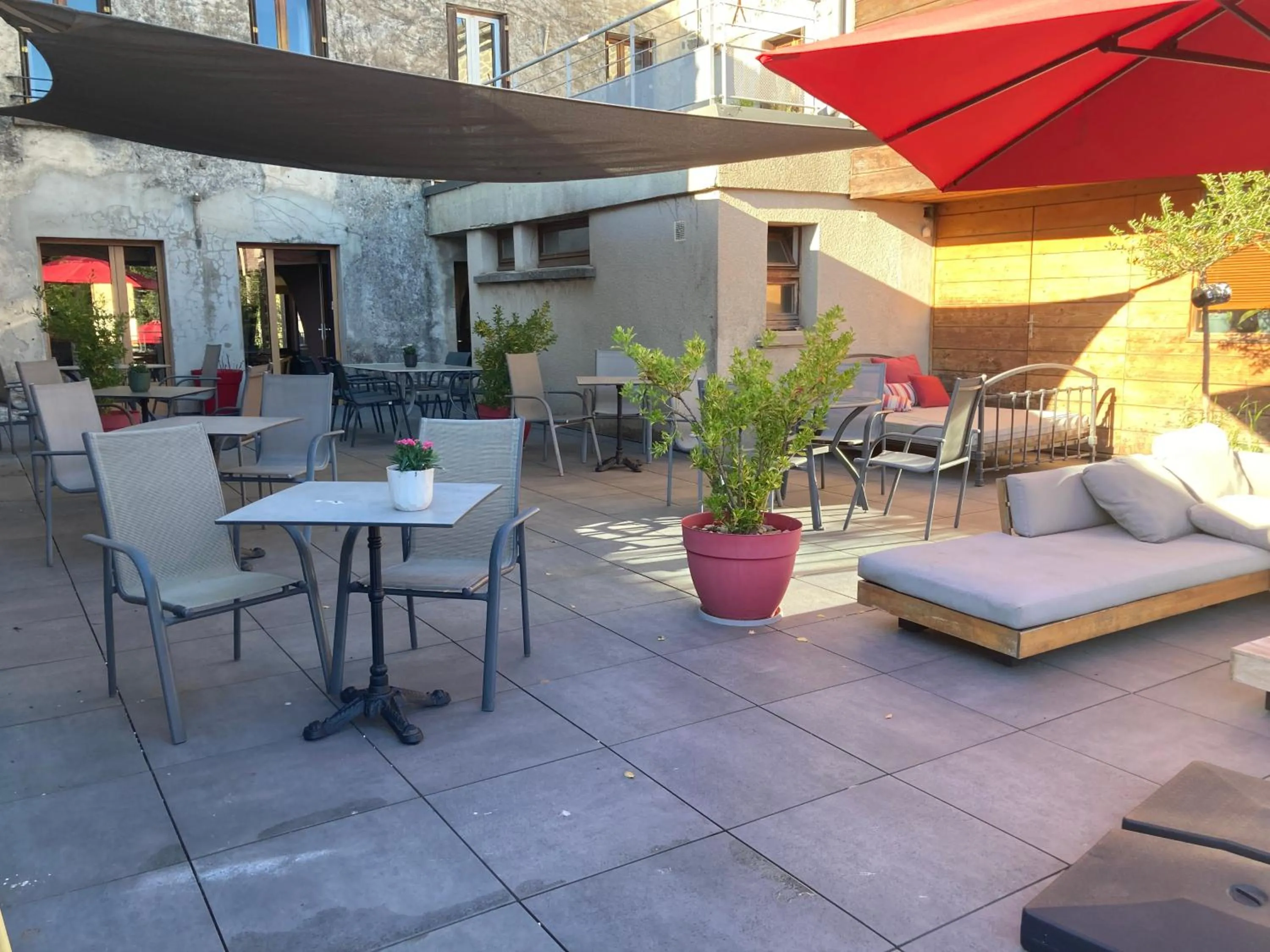 Patio in Logis Hôtel Restaurant Gilles Moreau Laguiole