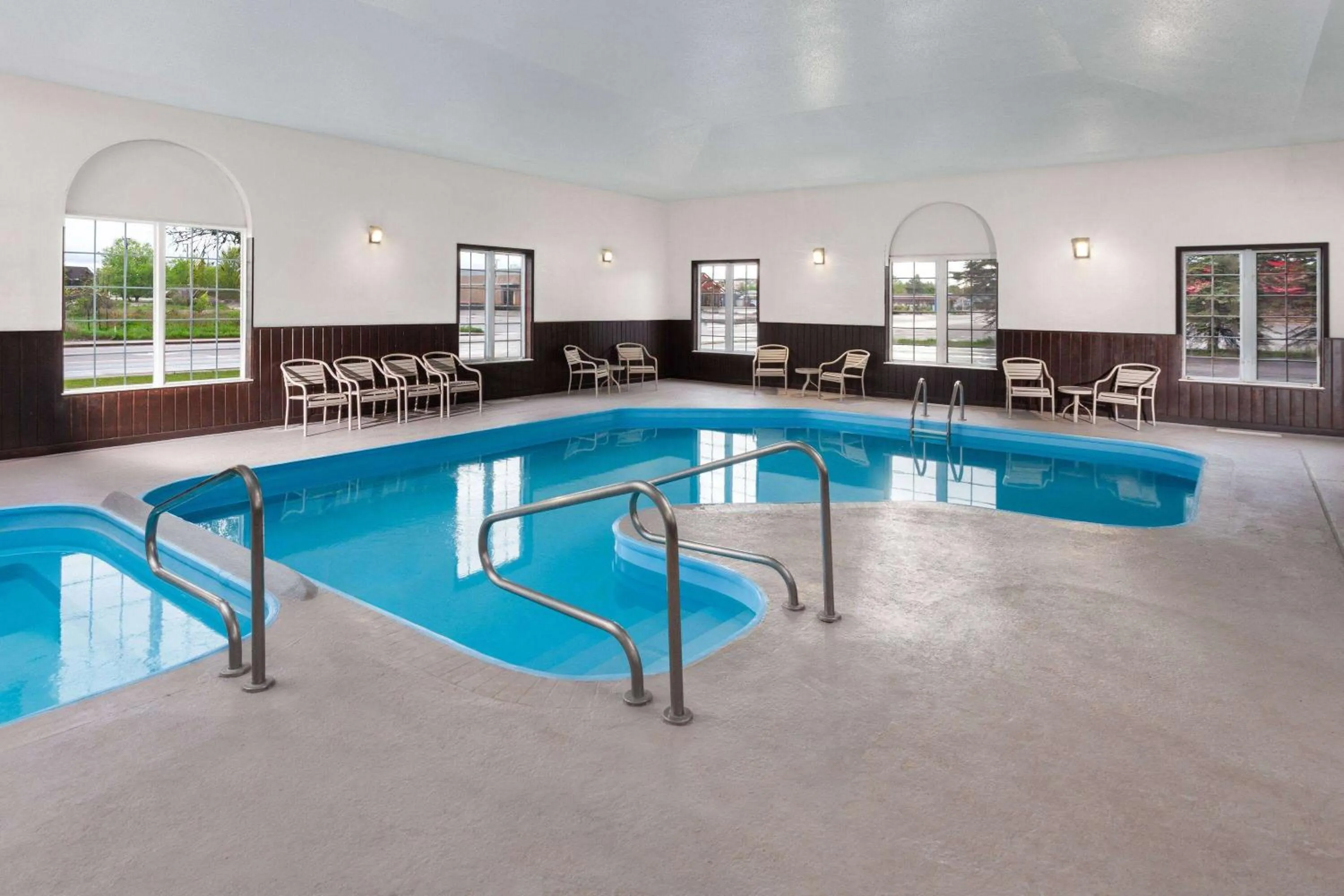 Swimming pool in AmericInn by Wyndham Eagle River Downtown