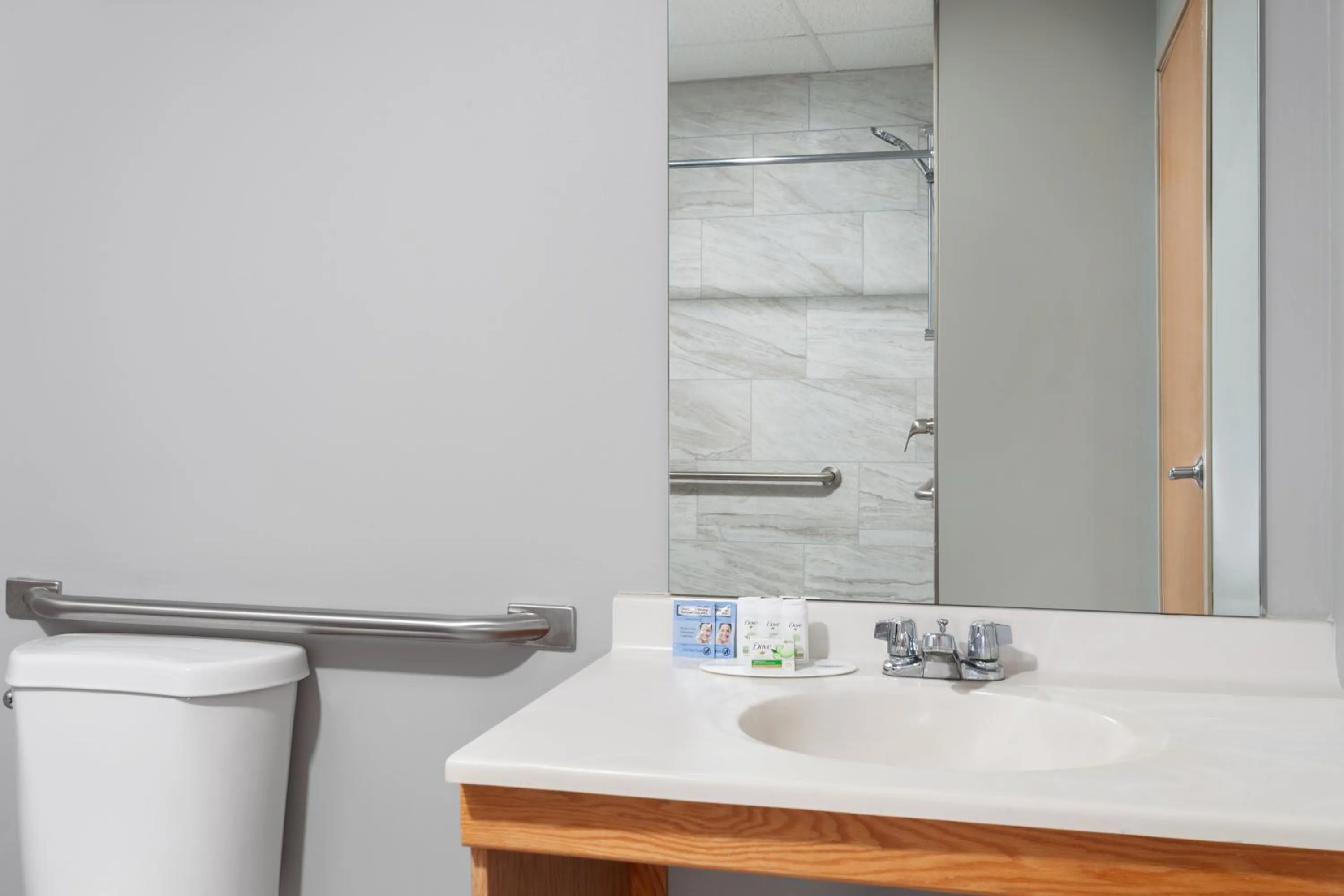 Bathroom in AmericInn by Wyndham Eagle River Downtown