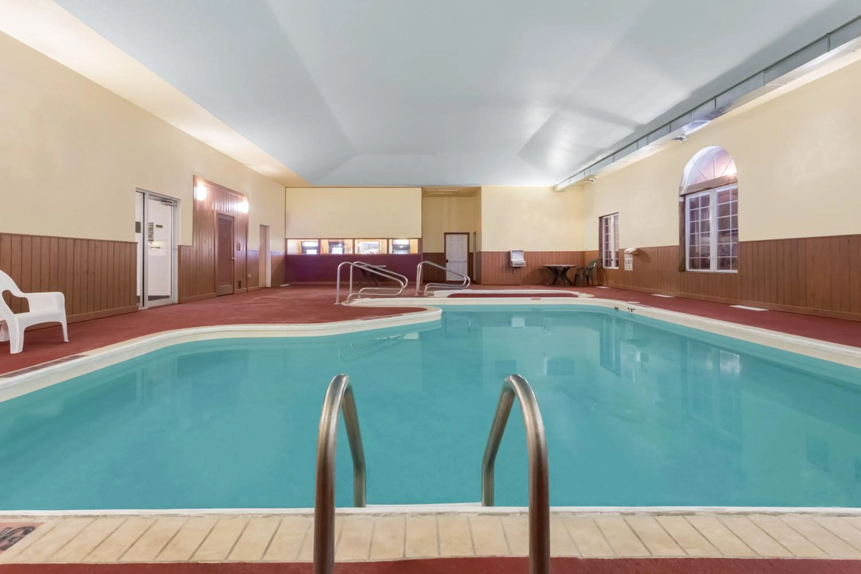 Swimming pool in AmericInn by Wyndham Eagle River Downtown