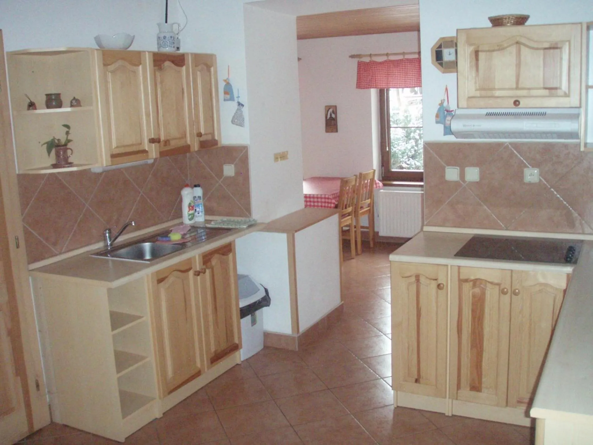 Kitchen or kitchenette in Penzion u Vodopádu