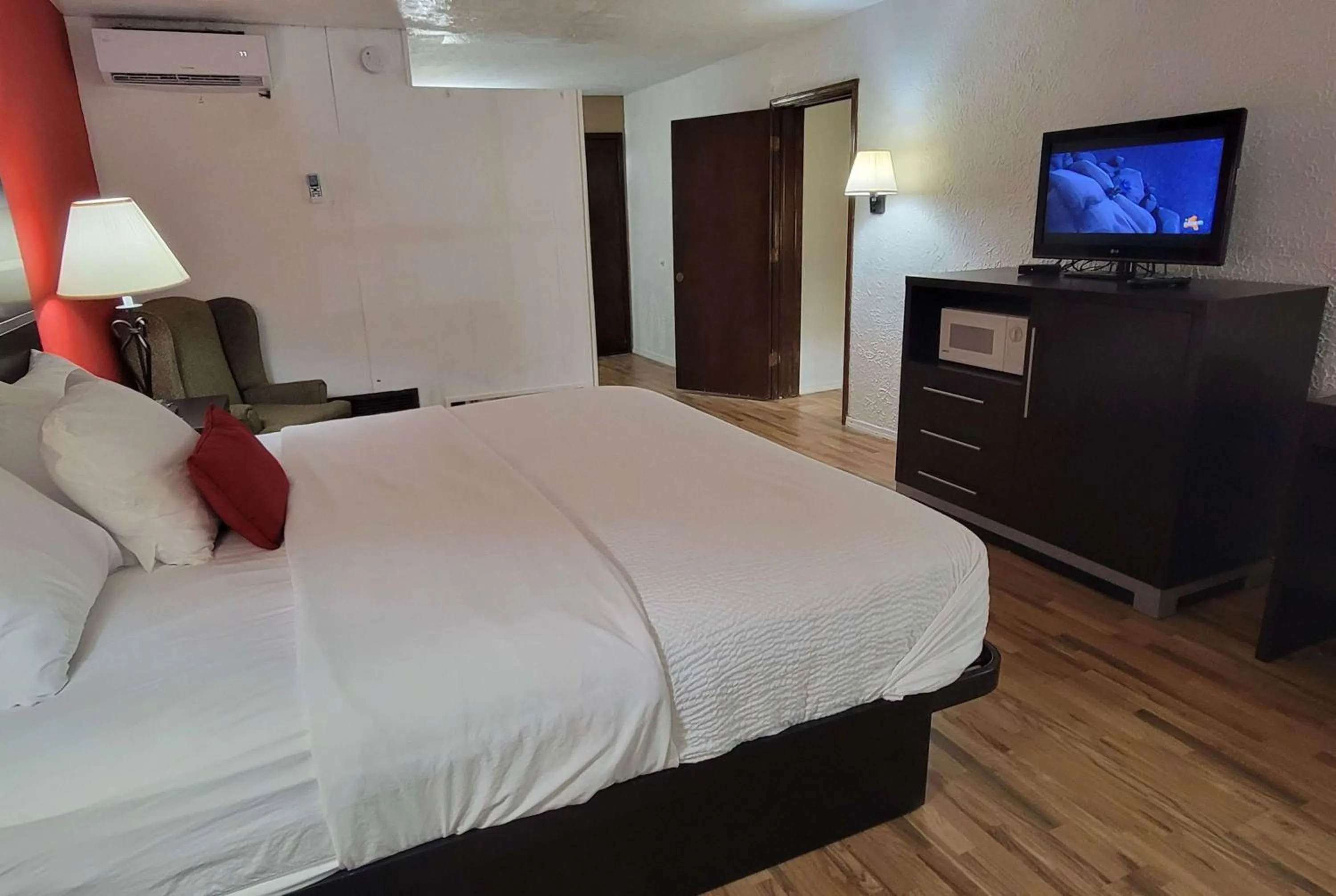 Photo of the whole room, Bed in Ramada by Wyndham Mountain Home