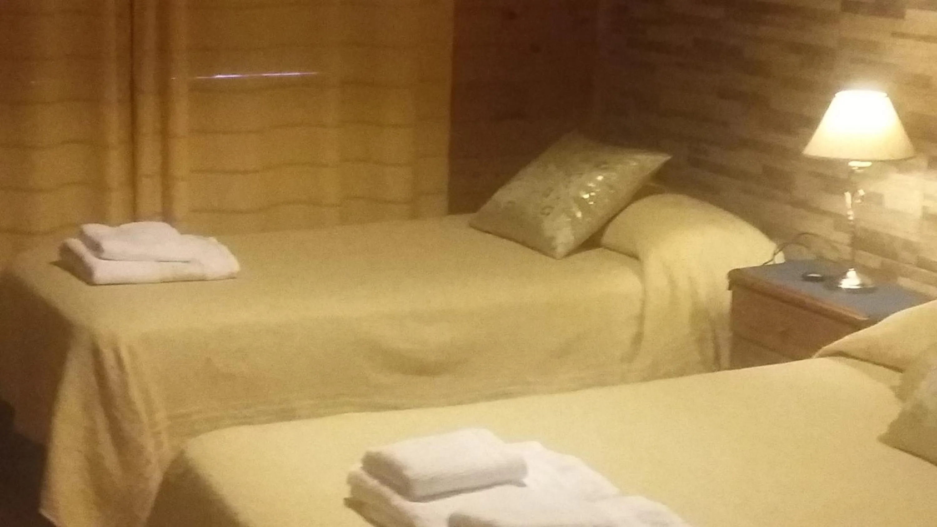 Bed in Hosteria Rukahué