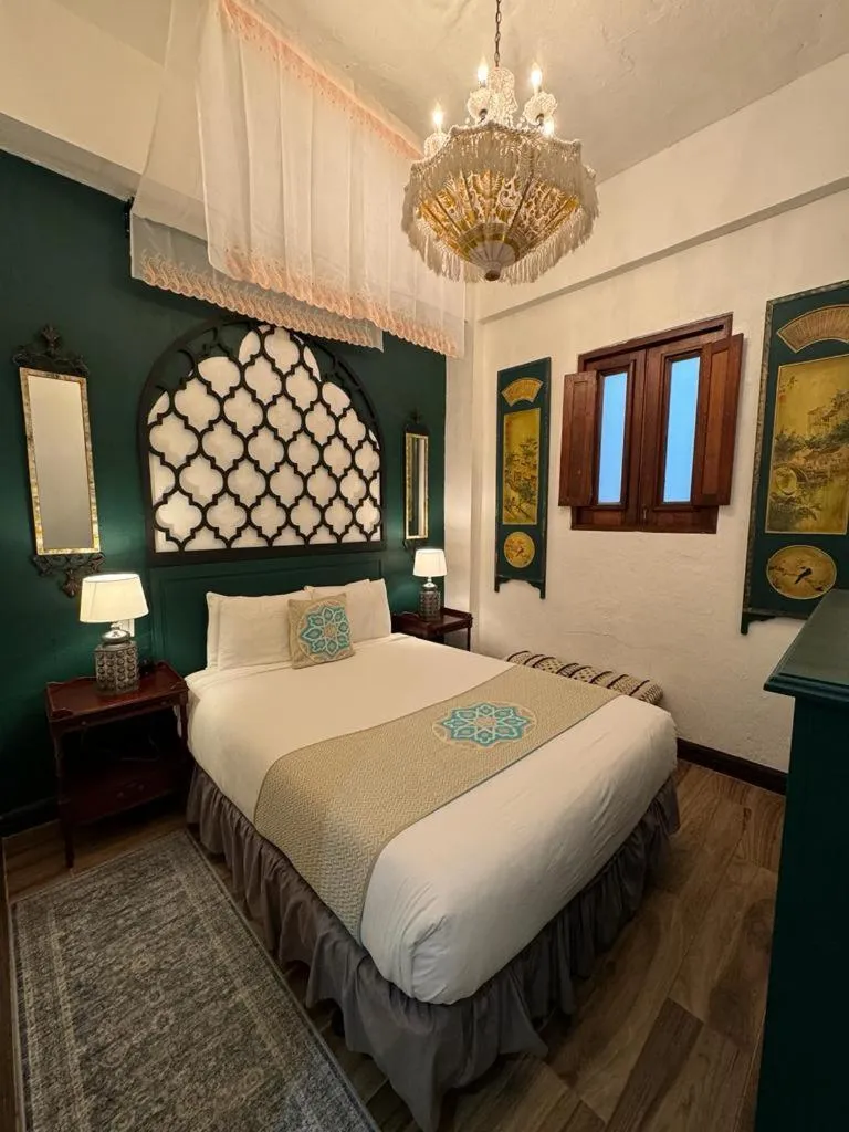 Bed in CasaBlanca Hotel