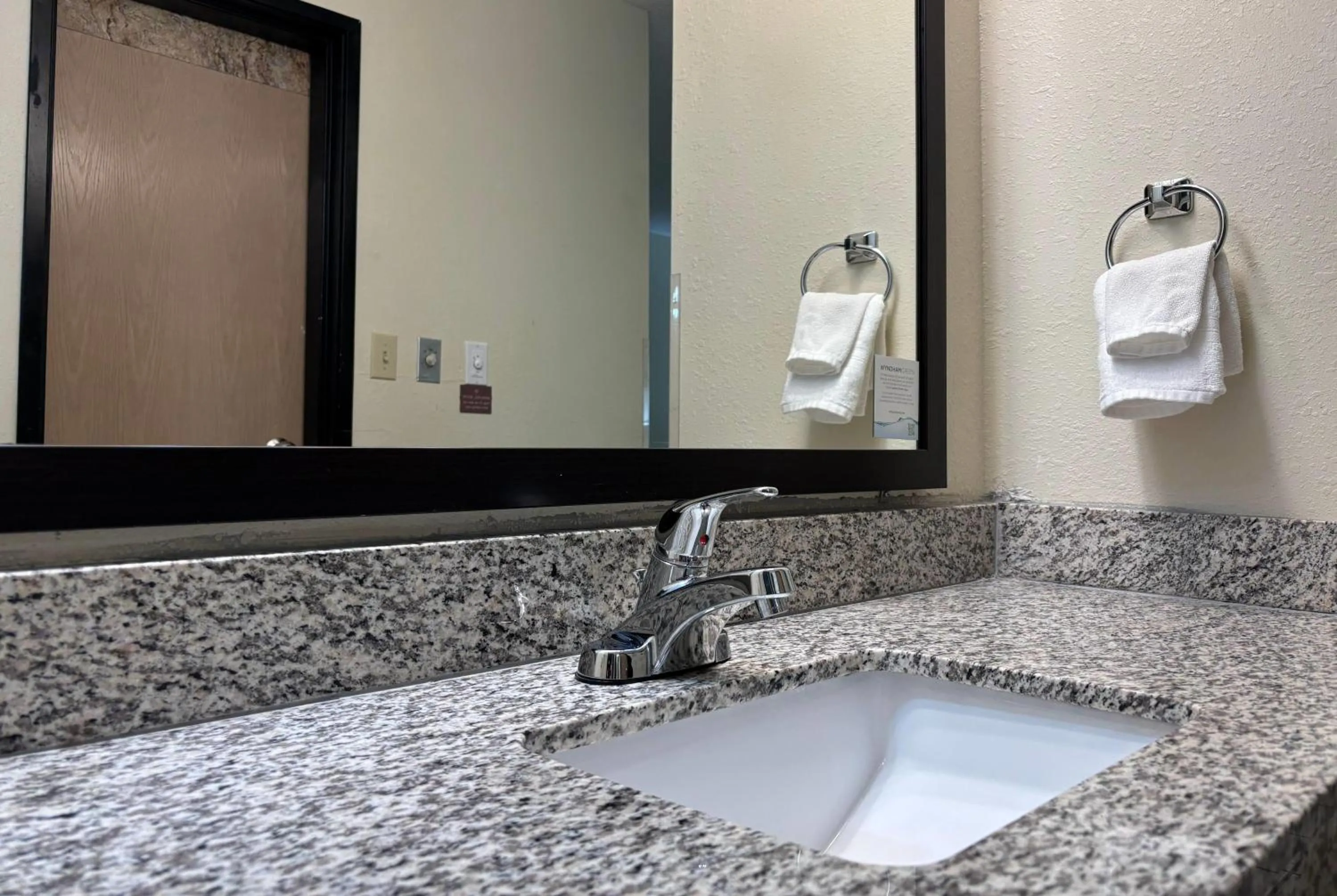 Bathroom in Super 8 by Wyndham Metropolis