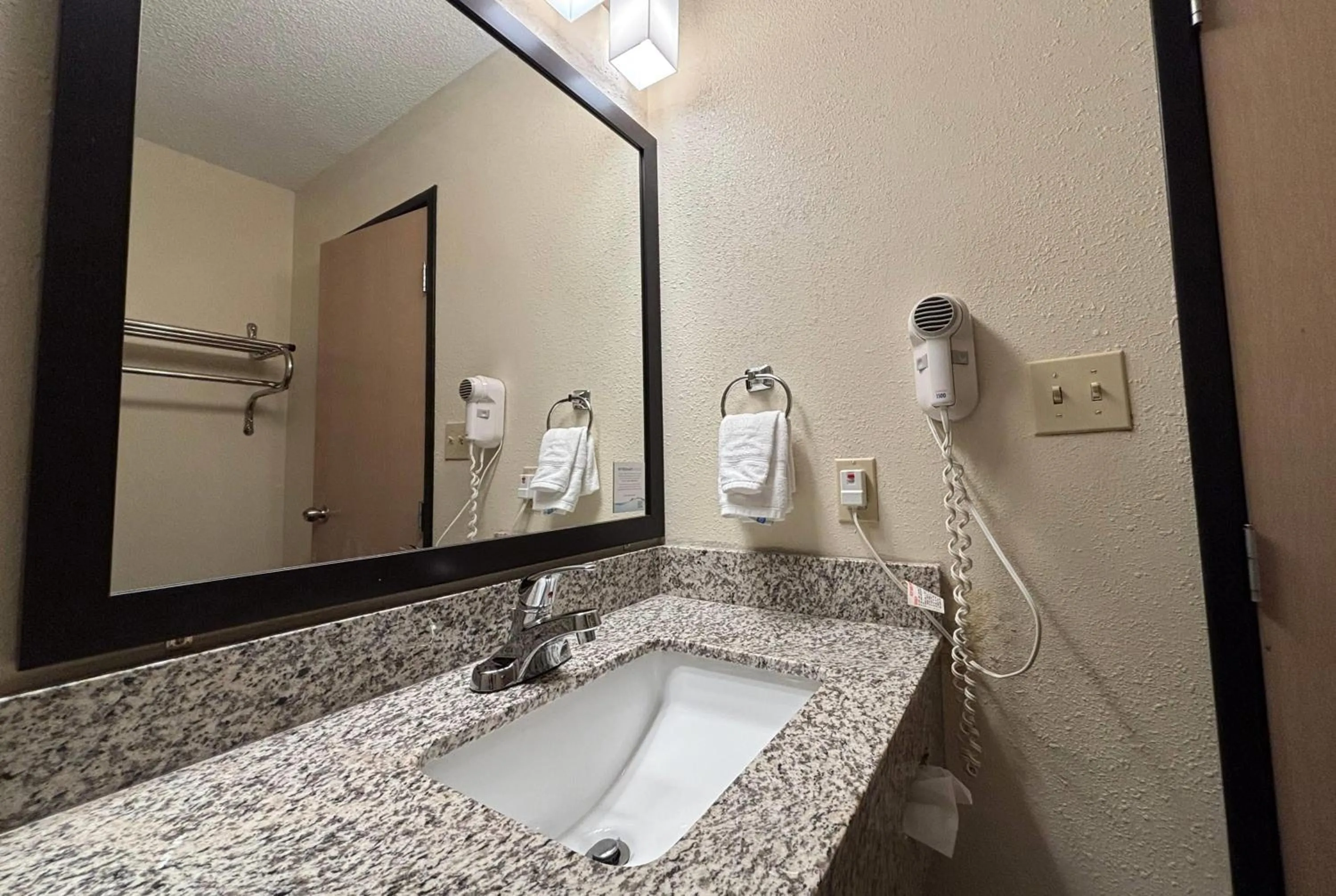Bathroom in Super 8 by Wyndham Metropolis