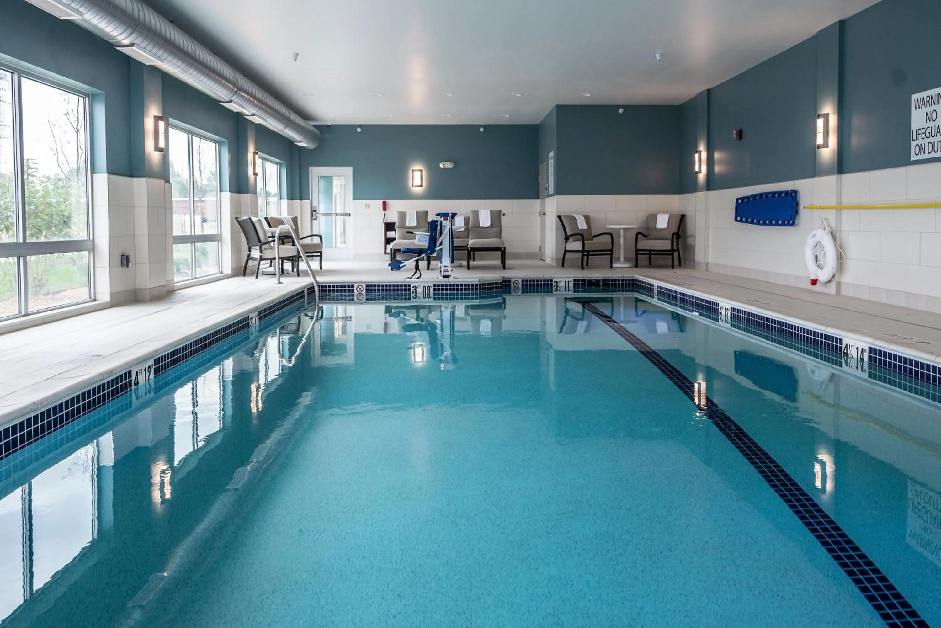 Swimming pool in Holiday Inn Express & Suites Allen Park, an IHG Hotel