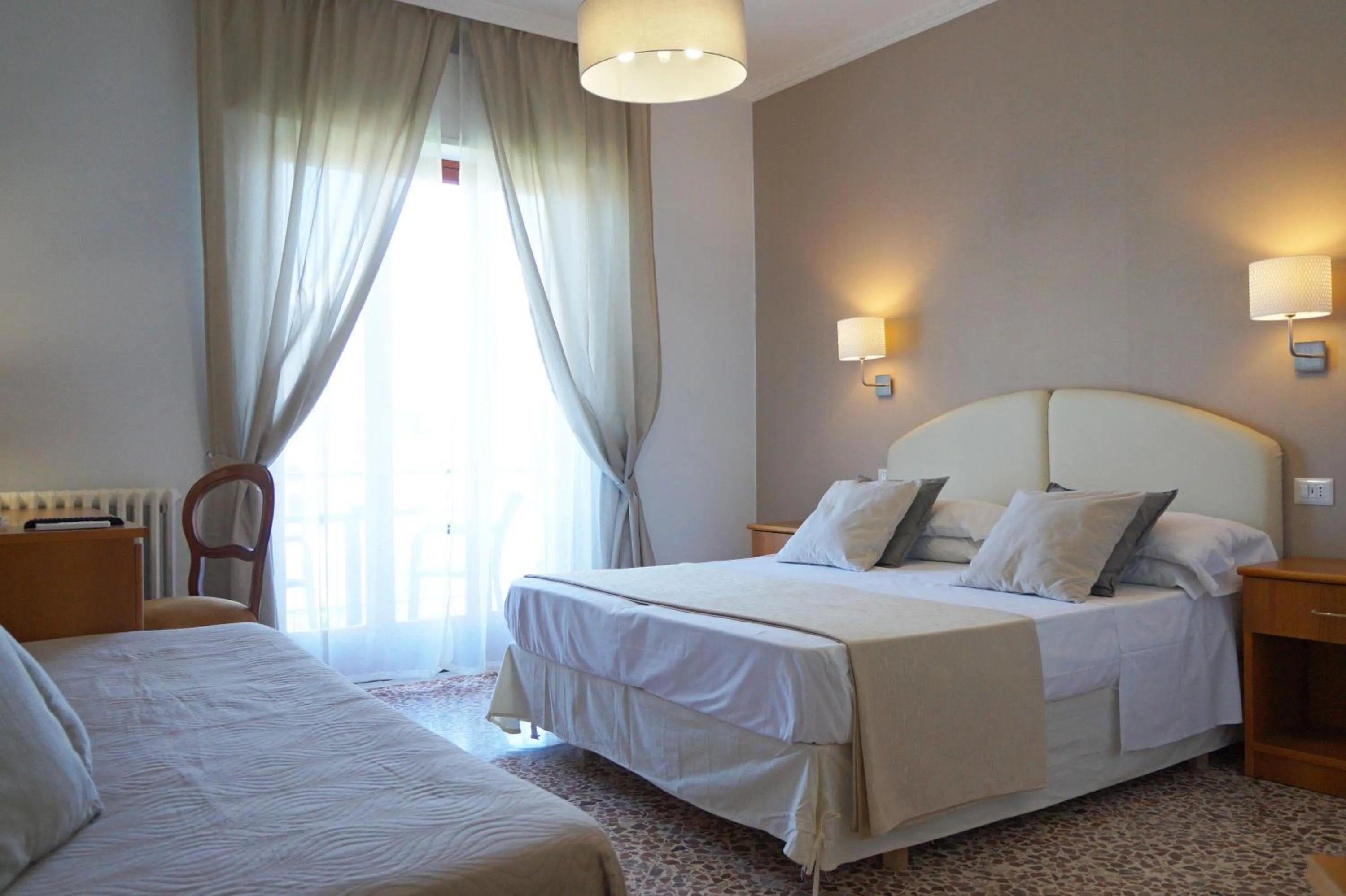 Bed in Villa Susy Relais