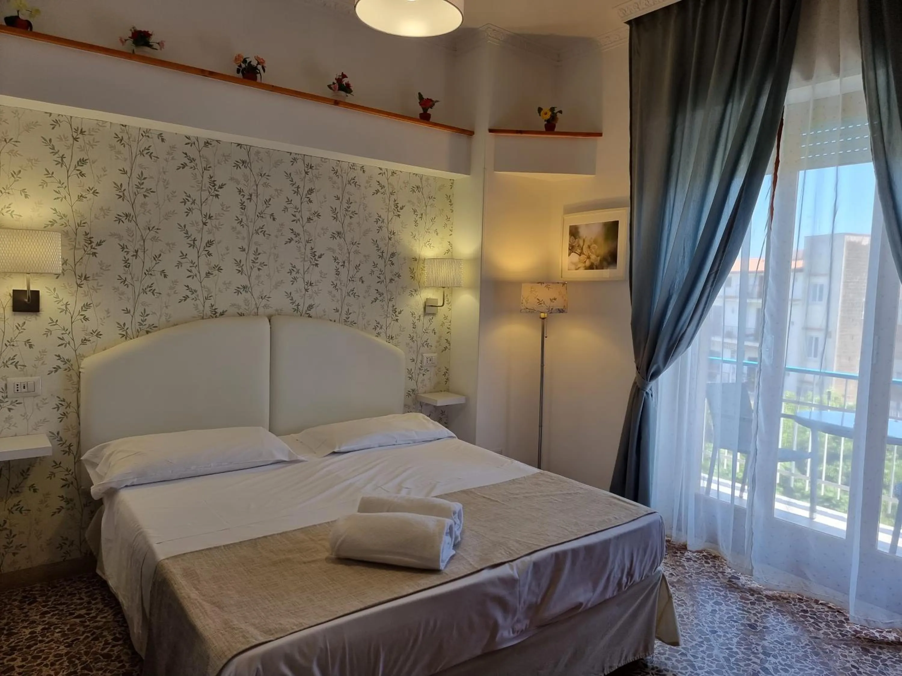 Bed in Villa Susy Relais