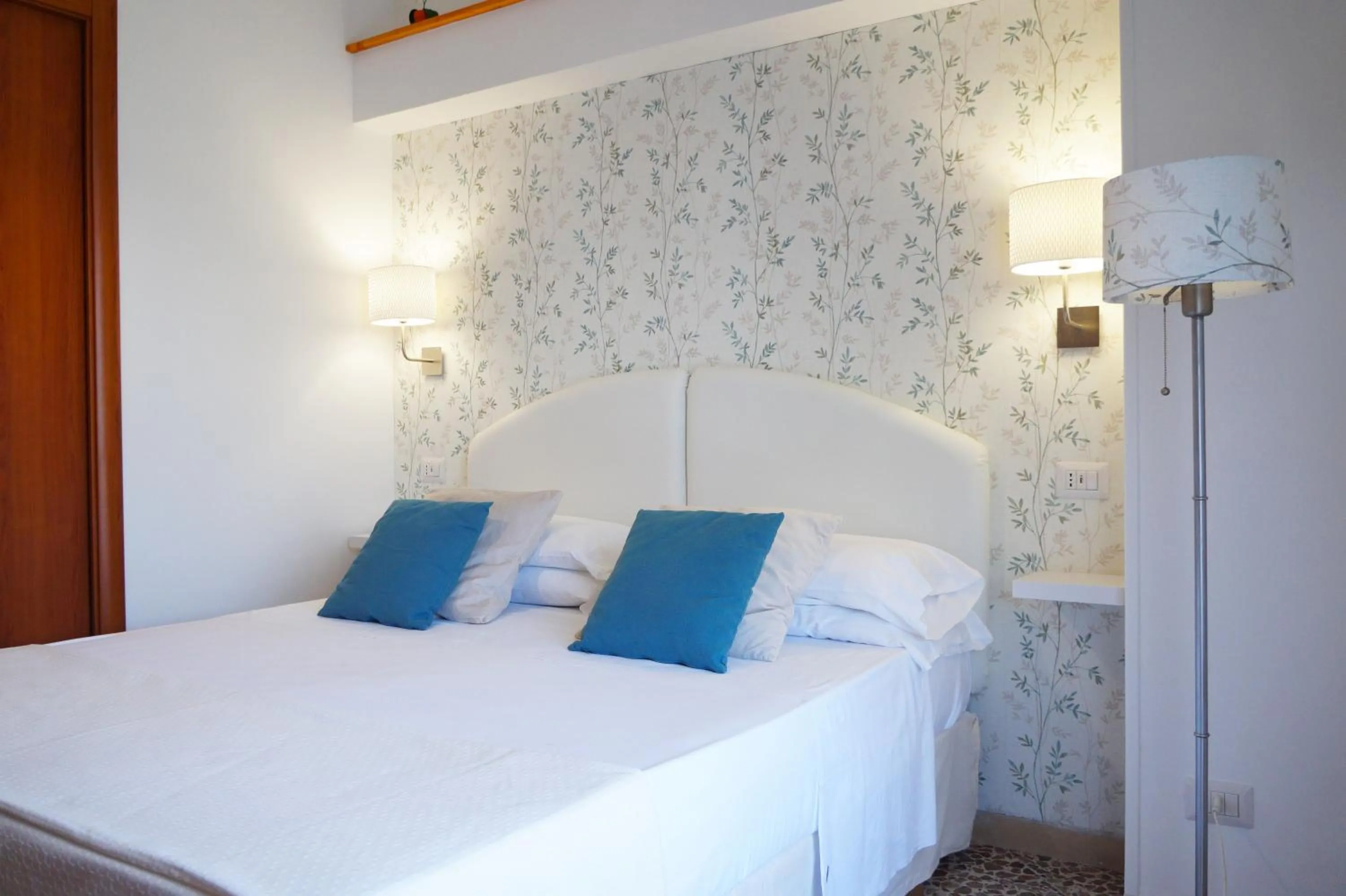 Bed in Villa Susy Relais