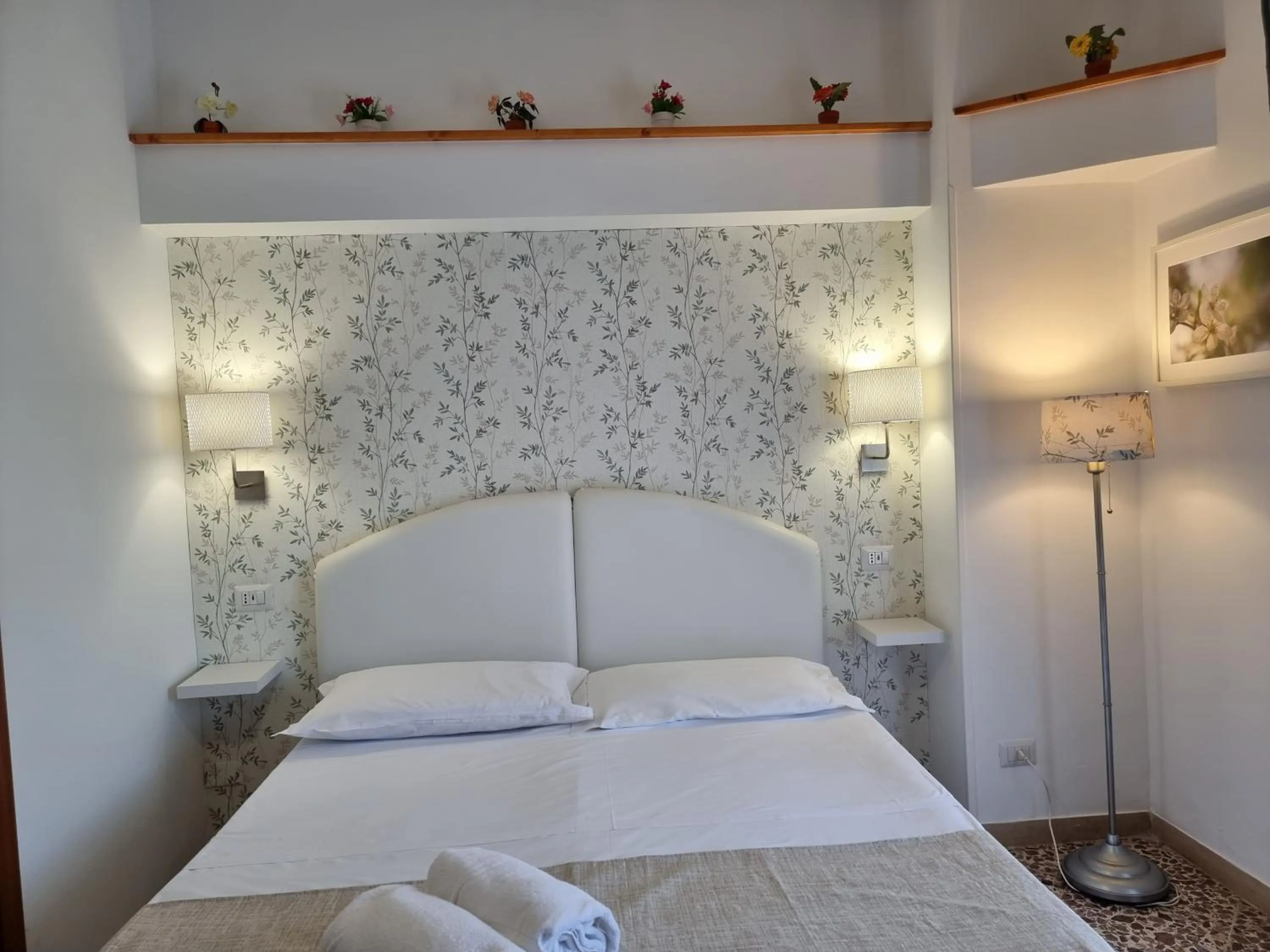 Bed in Villa Susy Relais