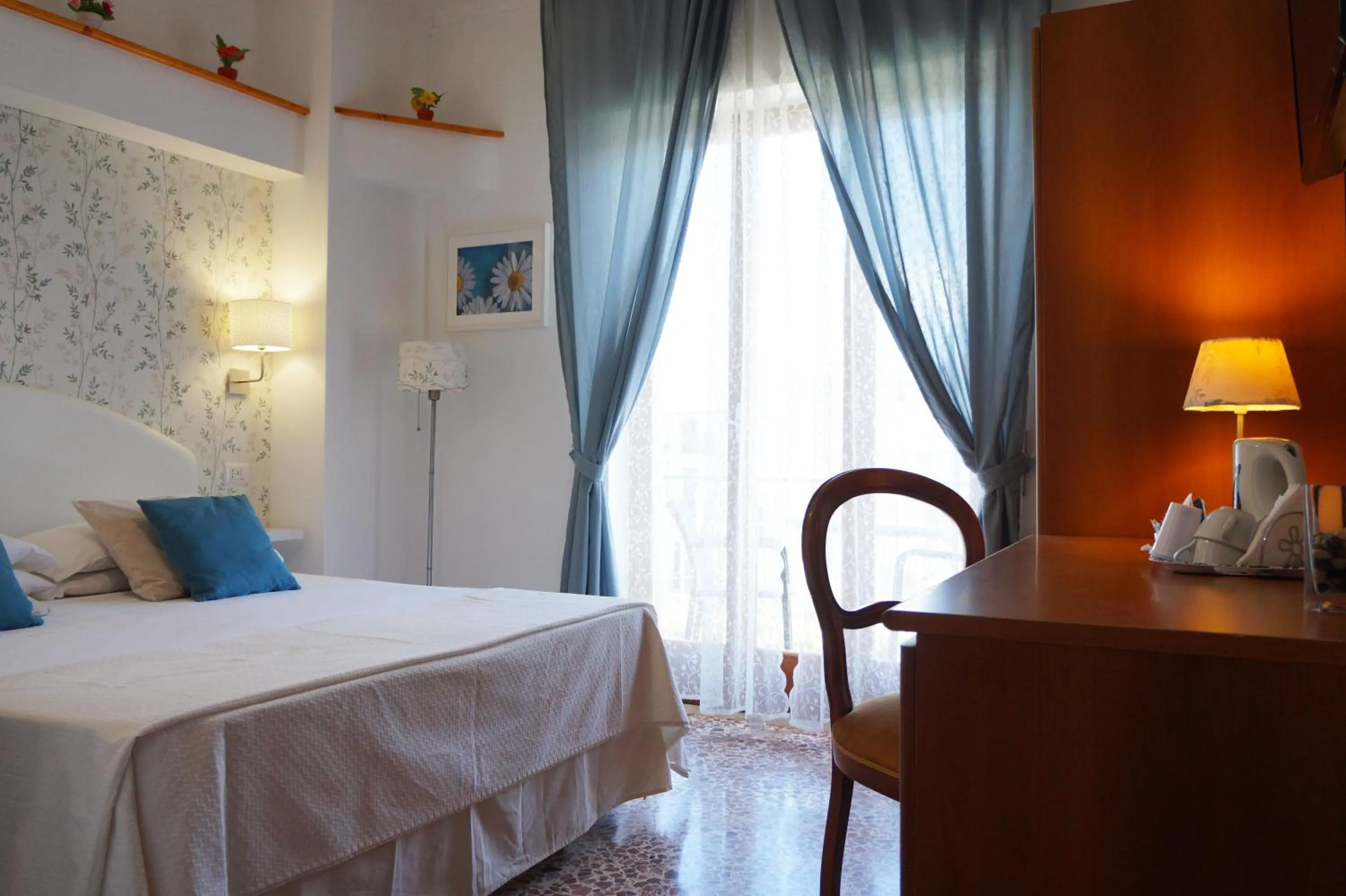 Bed in Villa Susy Relais