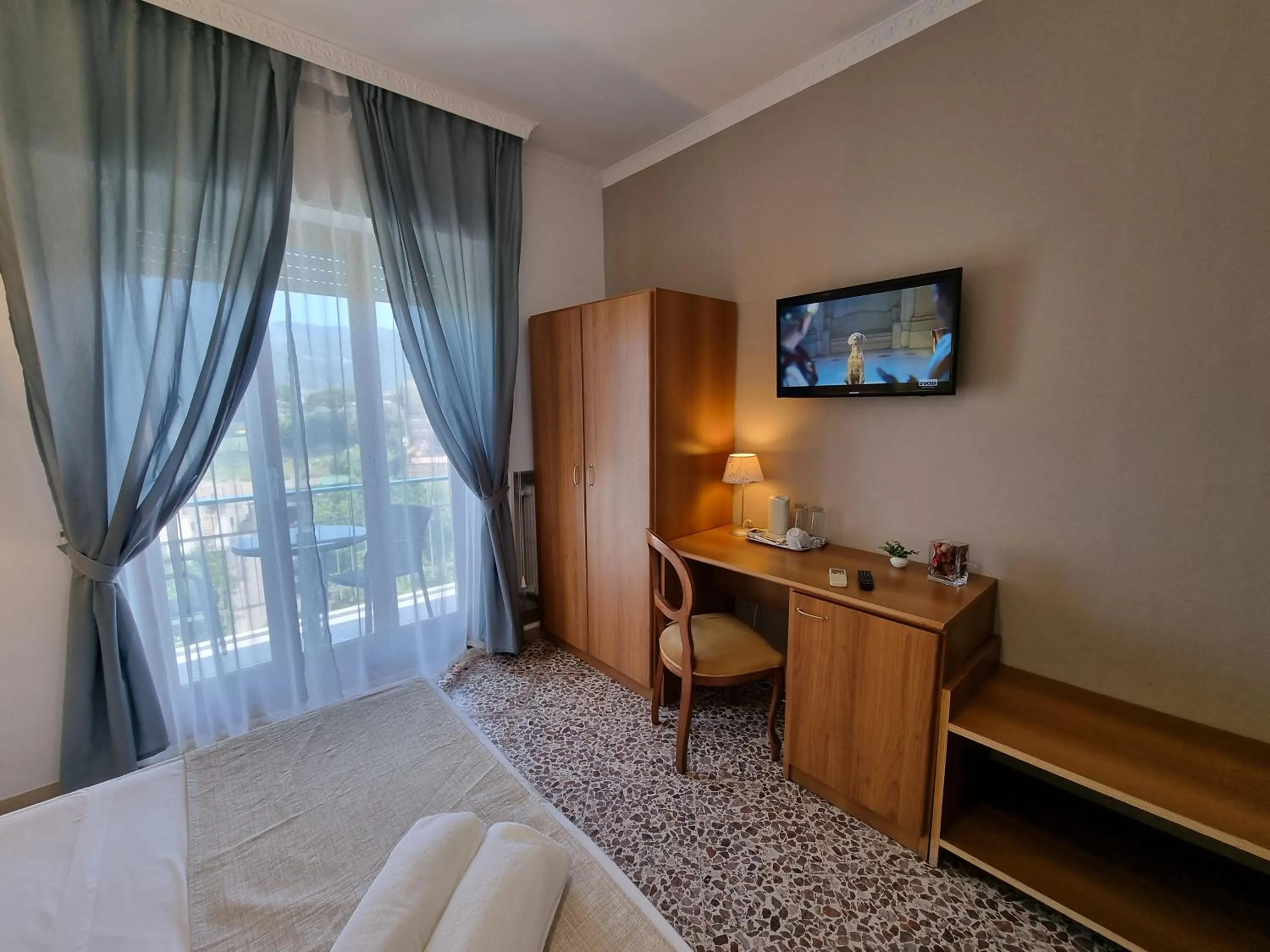 Bed in Villa Susy Relais