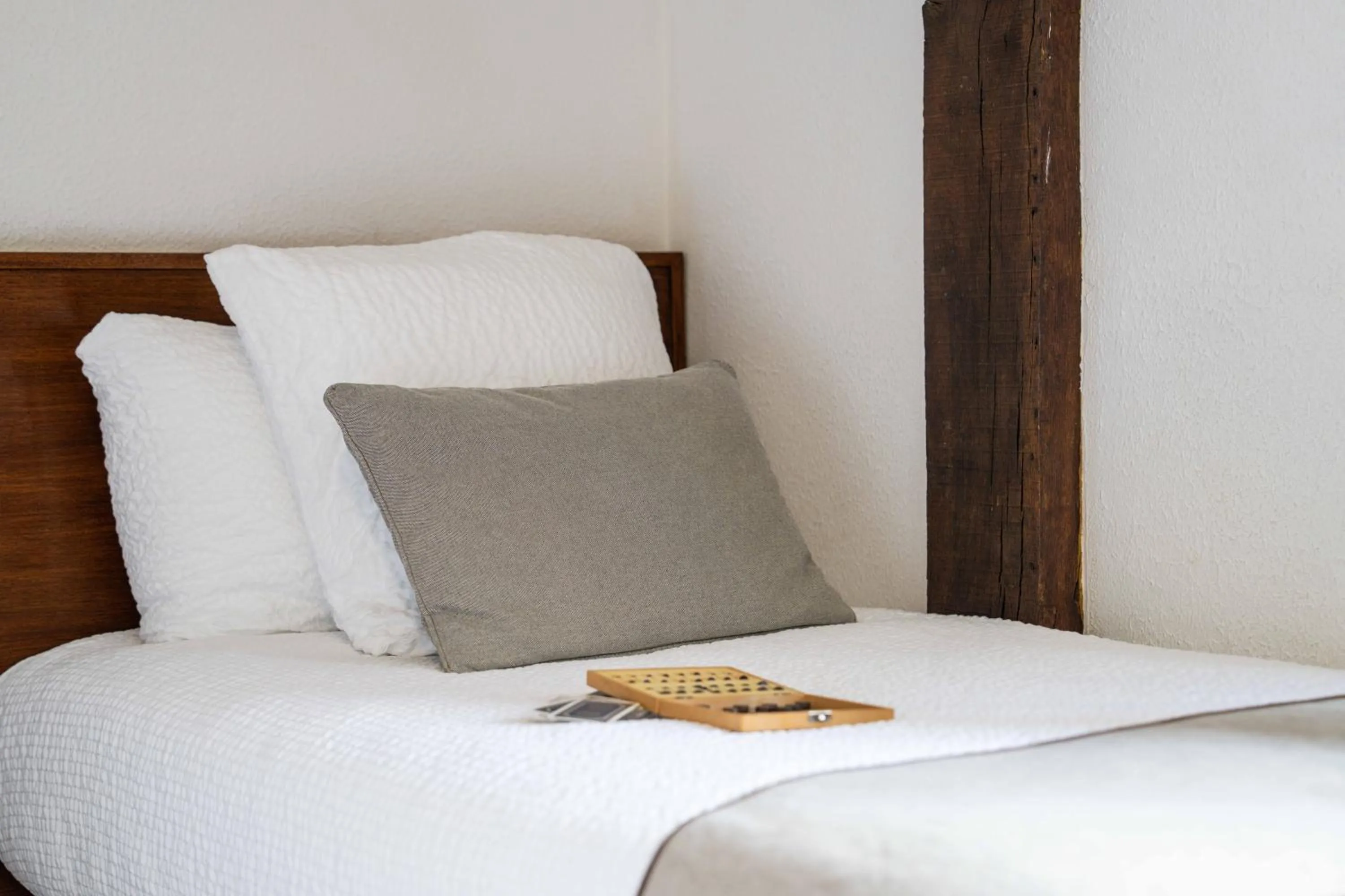 Bed in Logis Hôtel Baratxartea