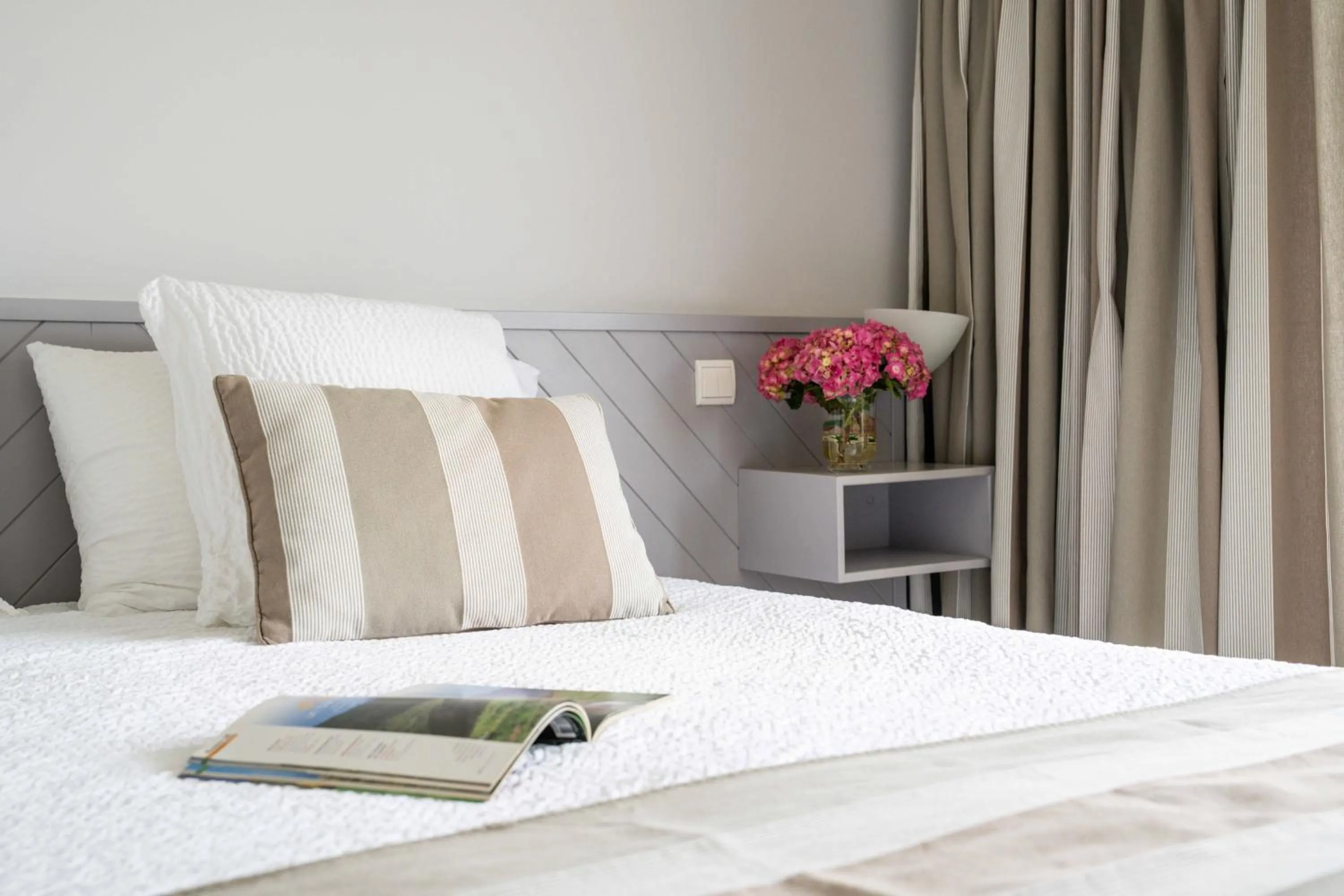 Bed in Logis Hôtel Baratxartea