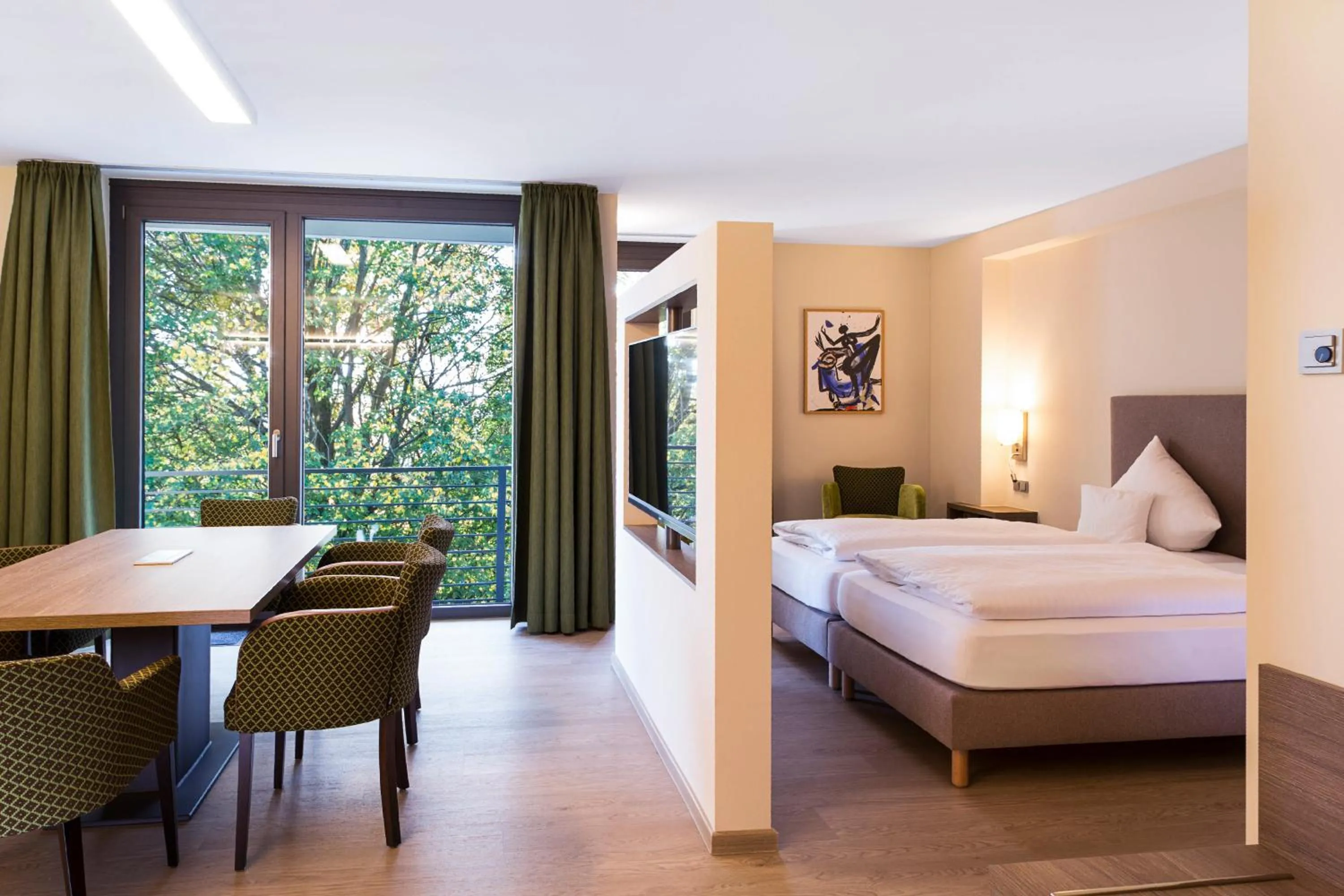 Photo of the whole room, Bed in SeminarZentrum Rückersbach