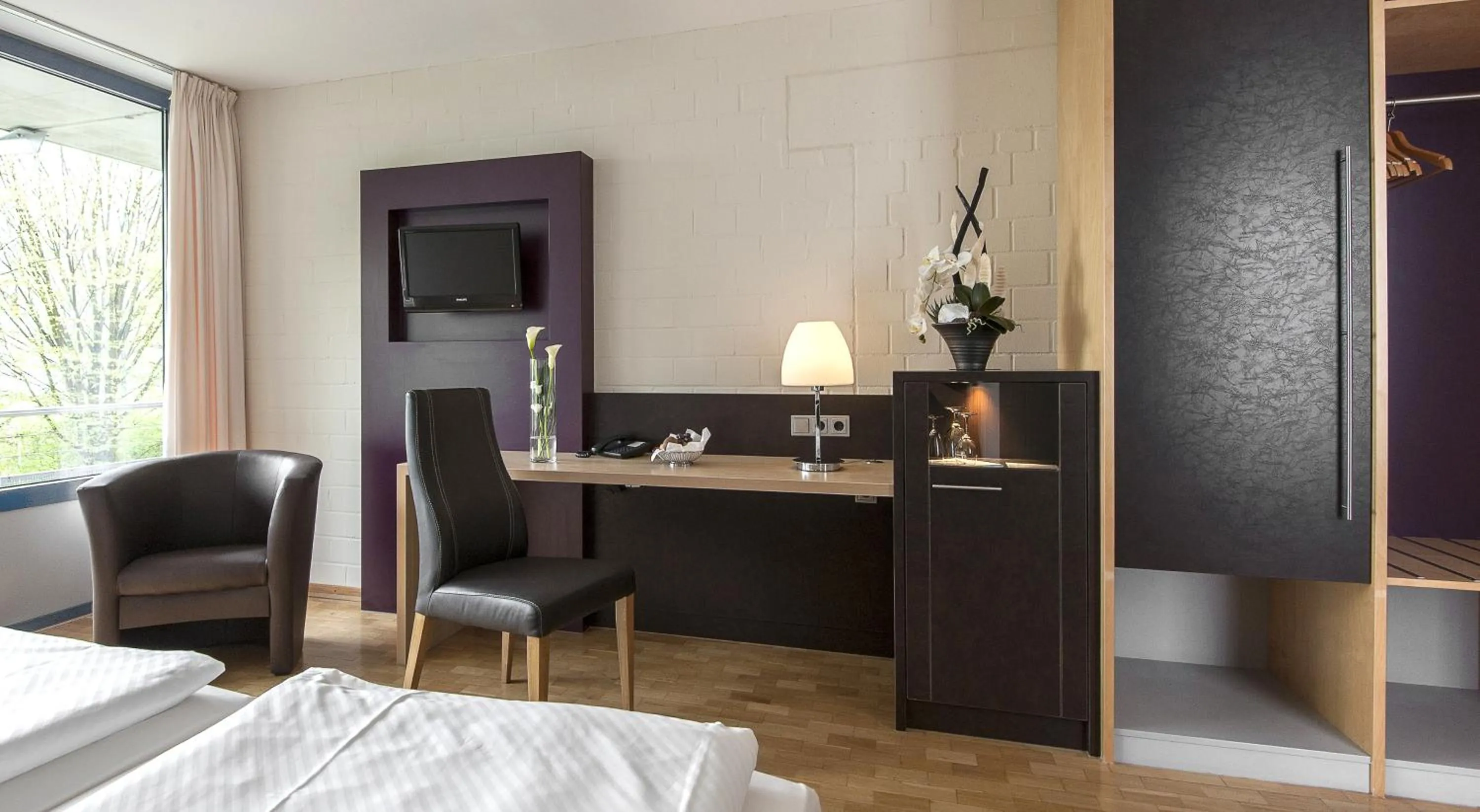 Photo of the whole room, Bed in SeminarZentrum Rückersbach