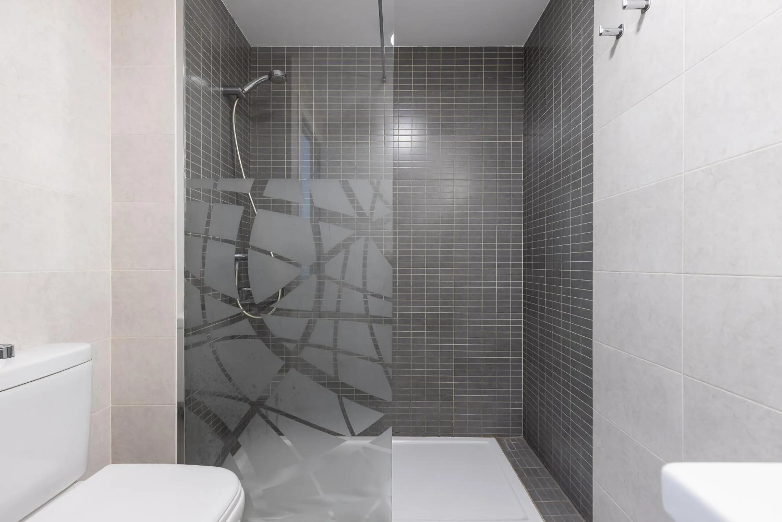 Shower in Rentalmar Zahara family suites