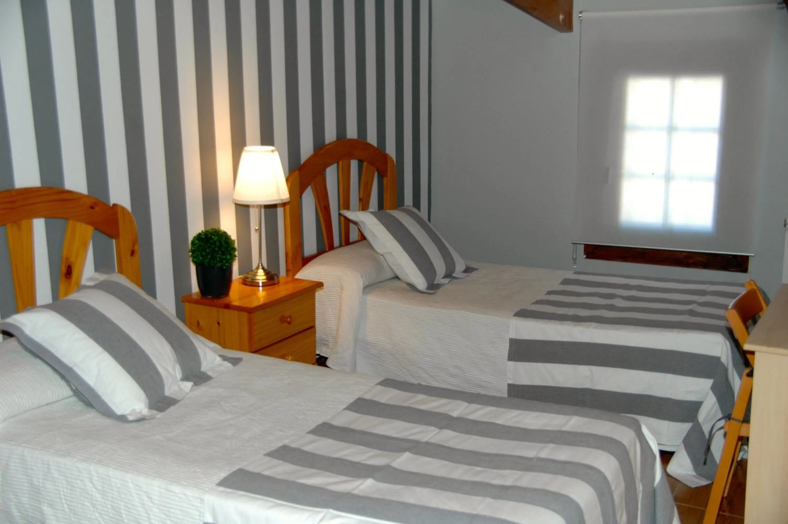 Bed in Hostal Cervantes