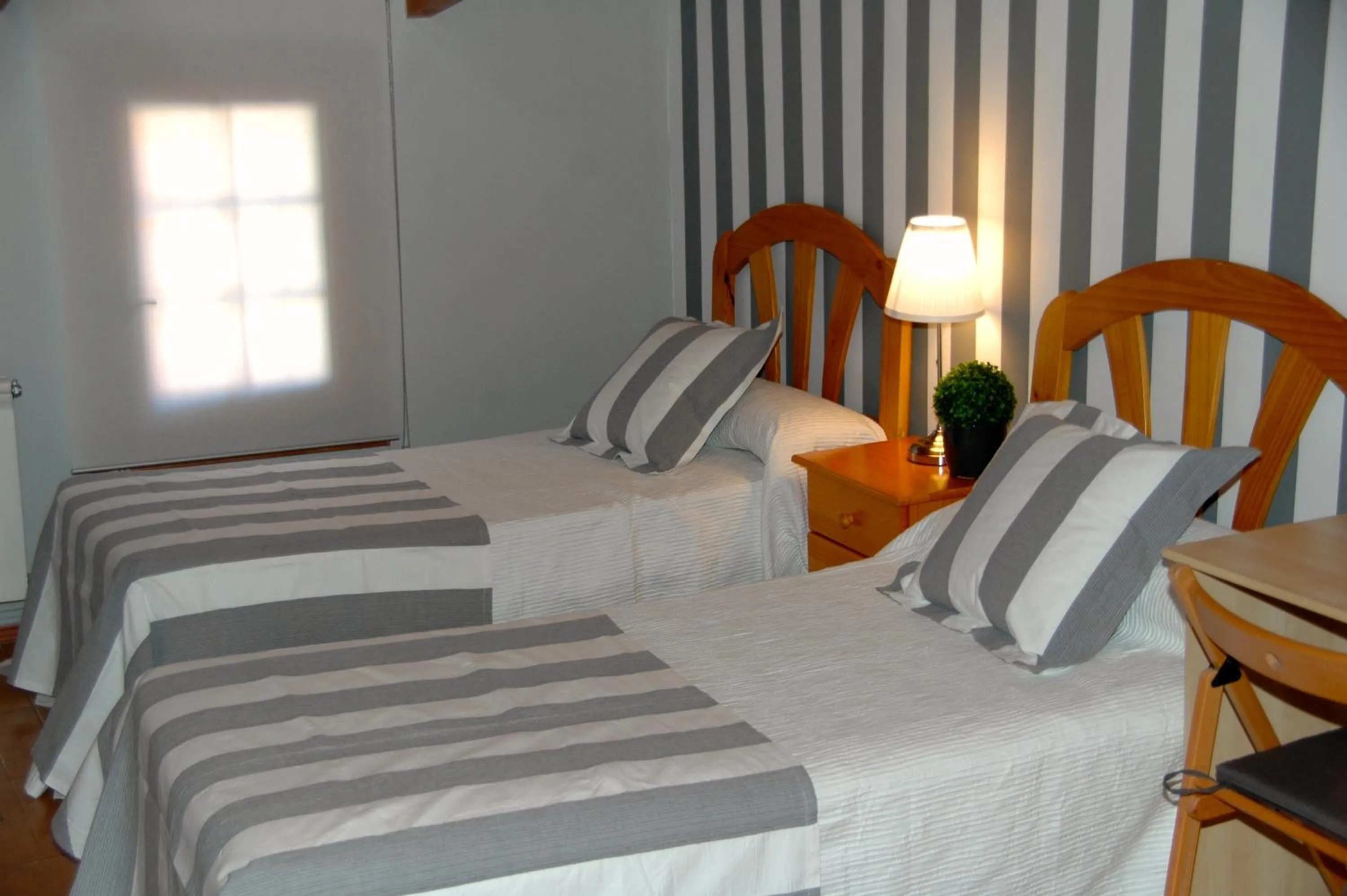 Bed in Hostal Cervantes